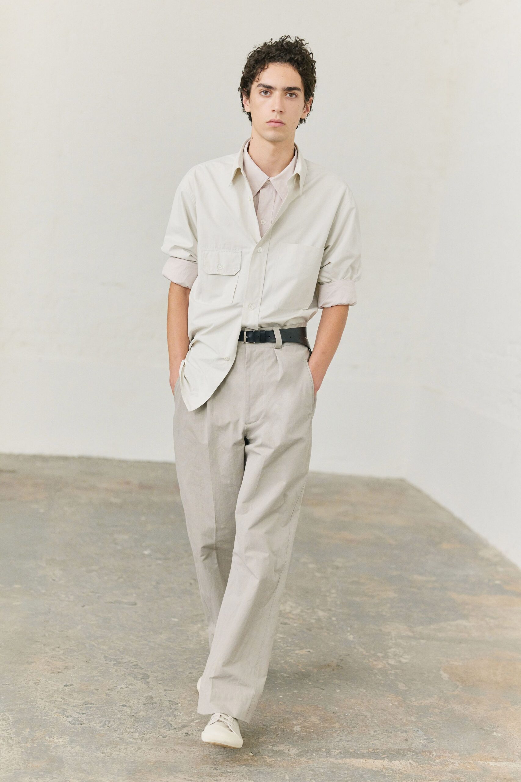 white shirt beige pants
