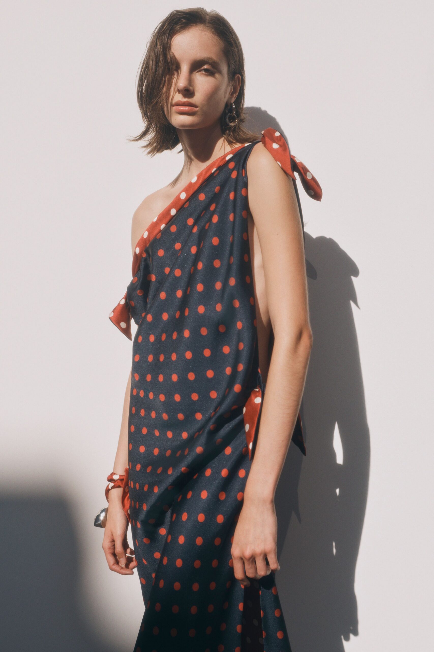 navy red polka-dot asymmetric dress