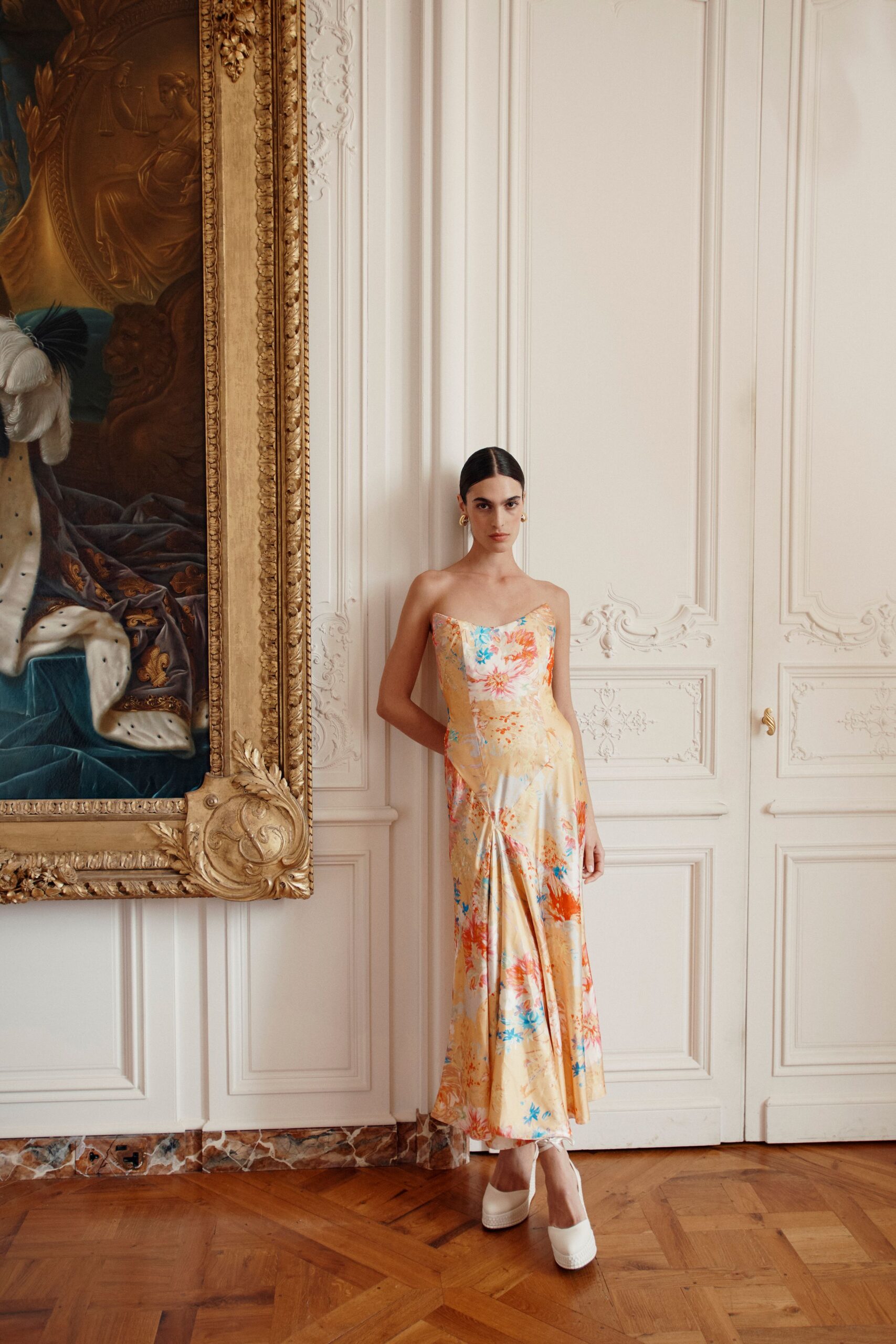 orange silk strapless fitted pleated flared midi dress