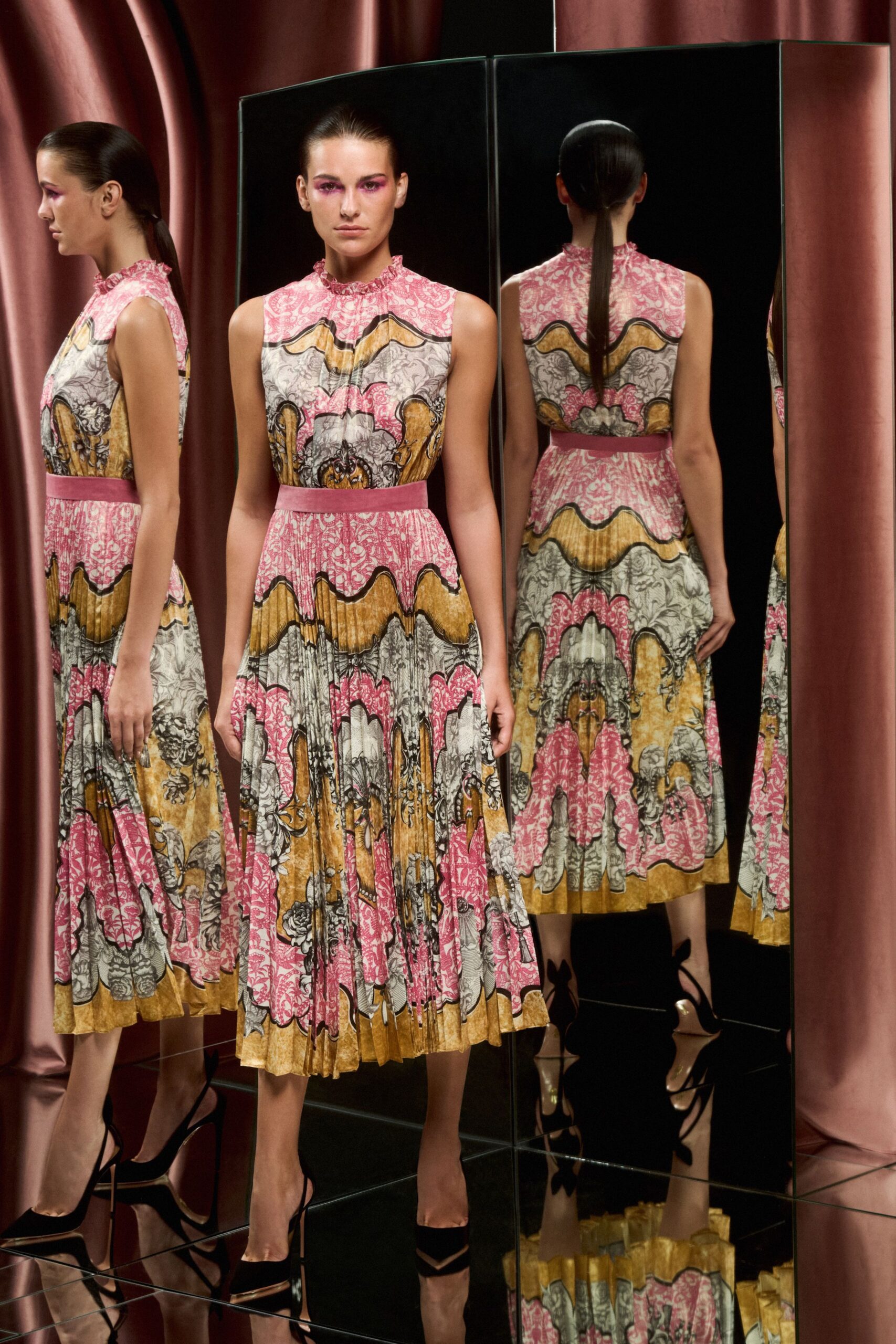 pink silk sleeveless collared fitted pleated printed dress