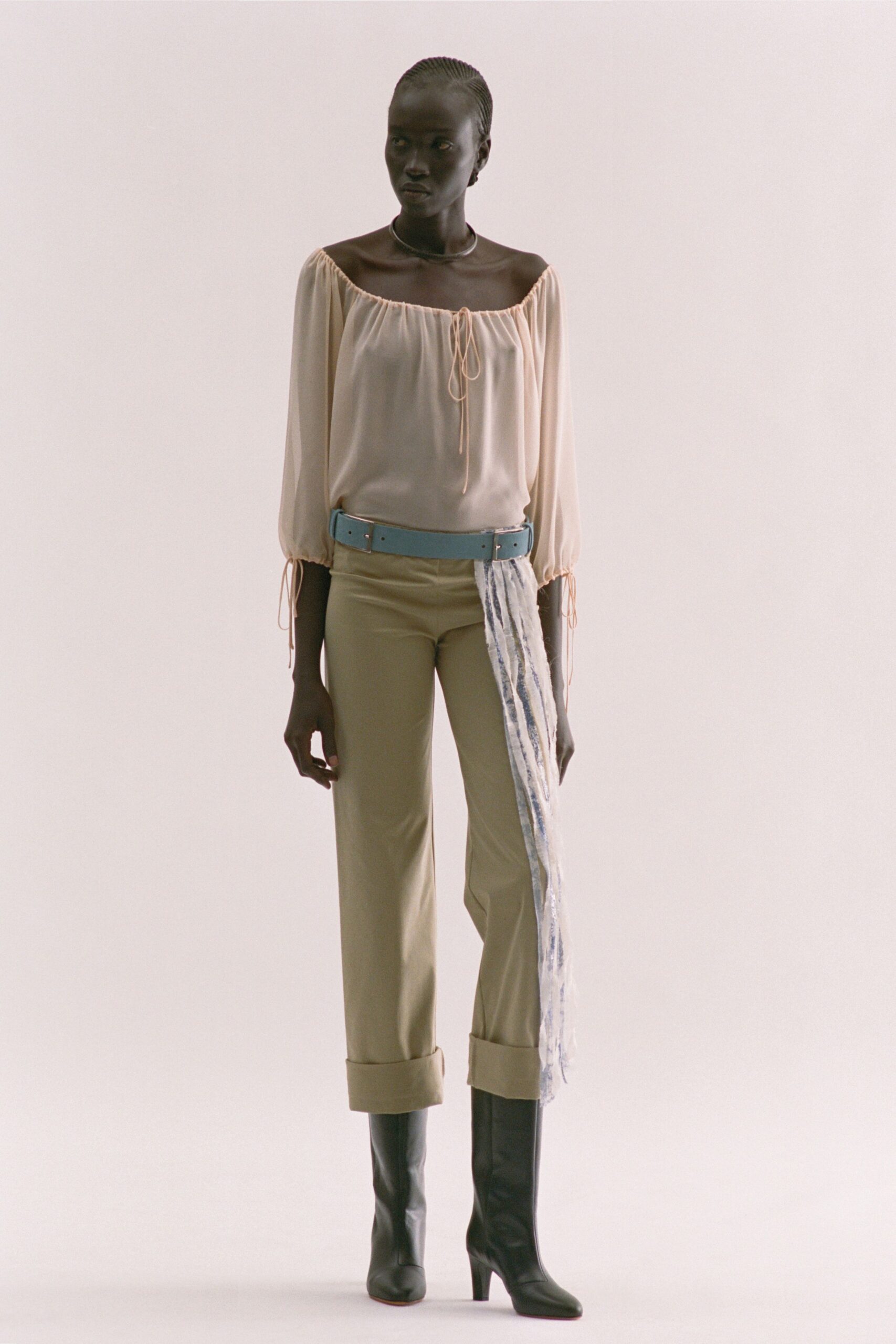 beige silk long-sleeve off-shoulder relaxed ruffled blouse