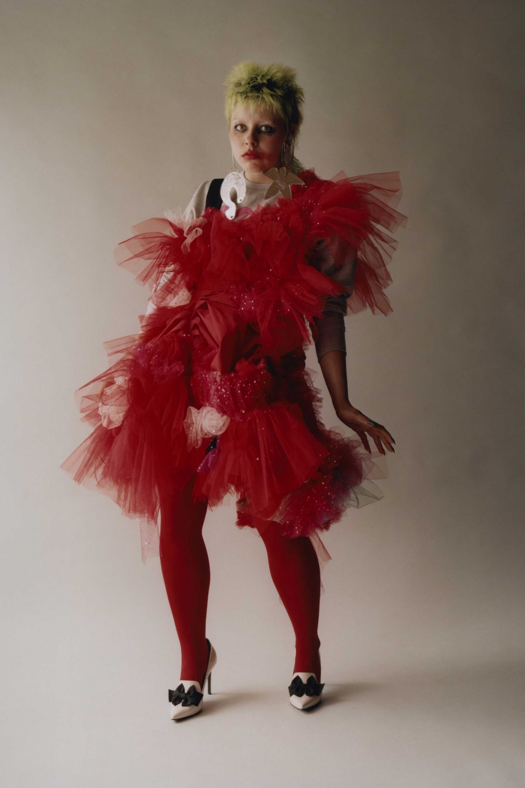 red tulle sleeveless fitted ruffled layered flowing dress