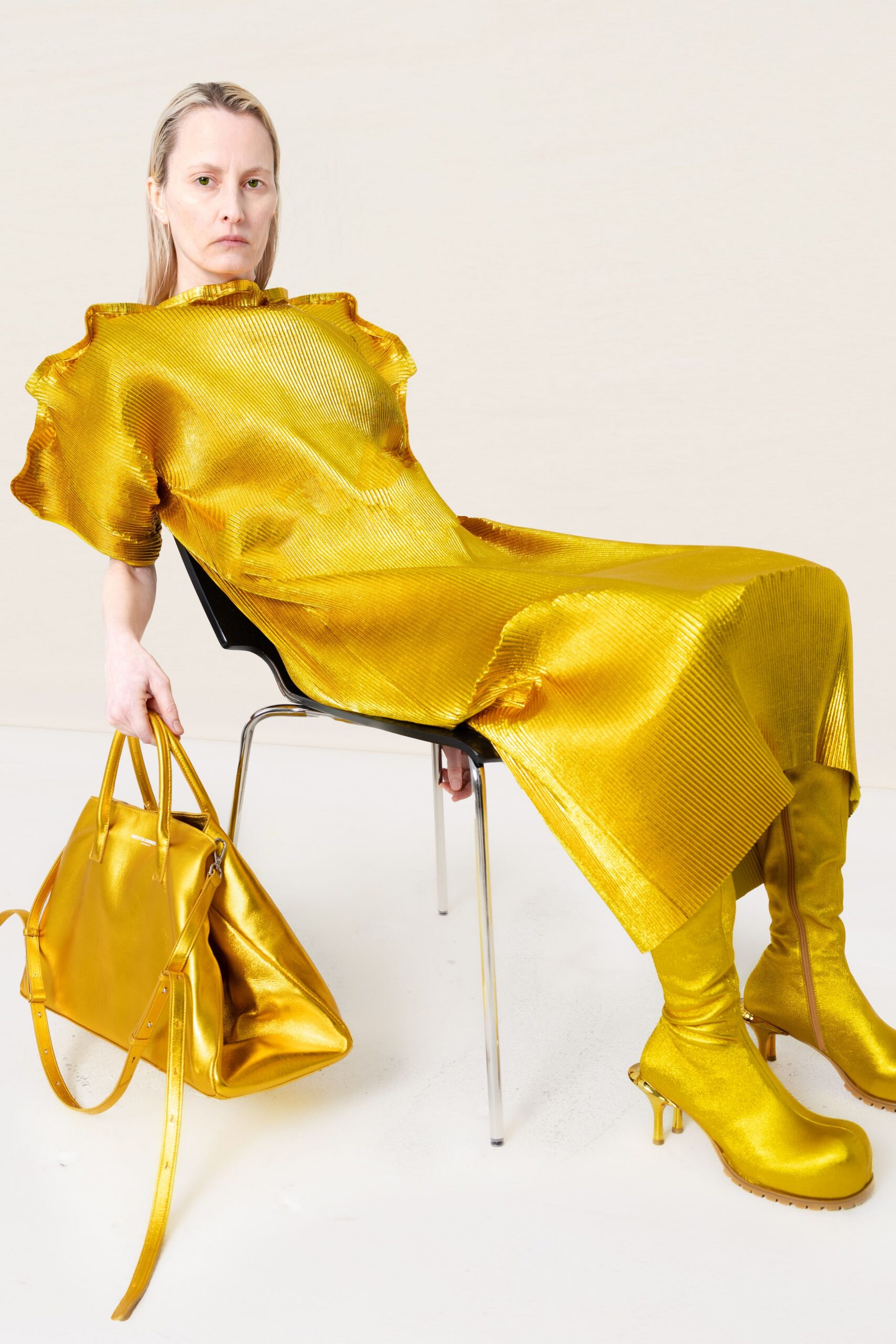 yellow silk short-sleeve high-neck fitted pleated shiny dress