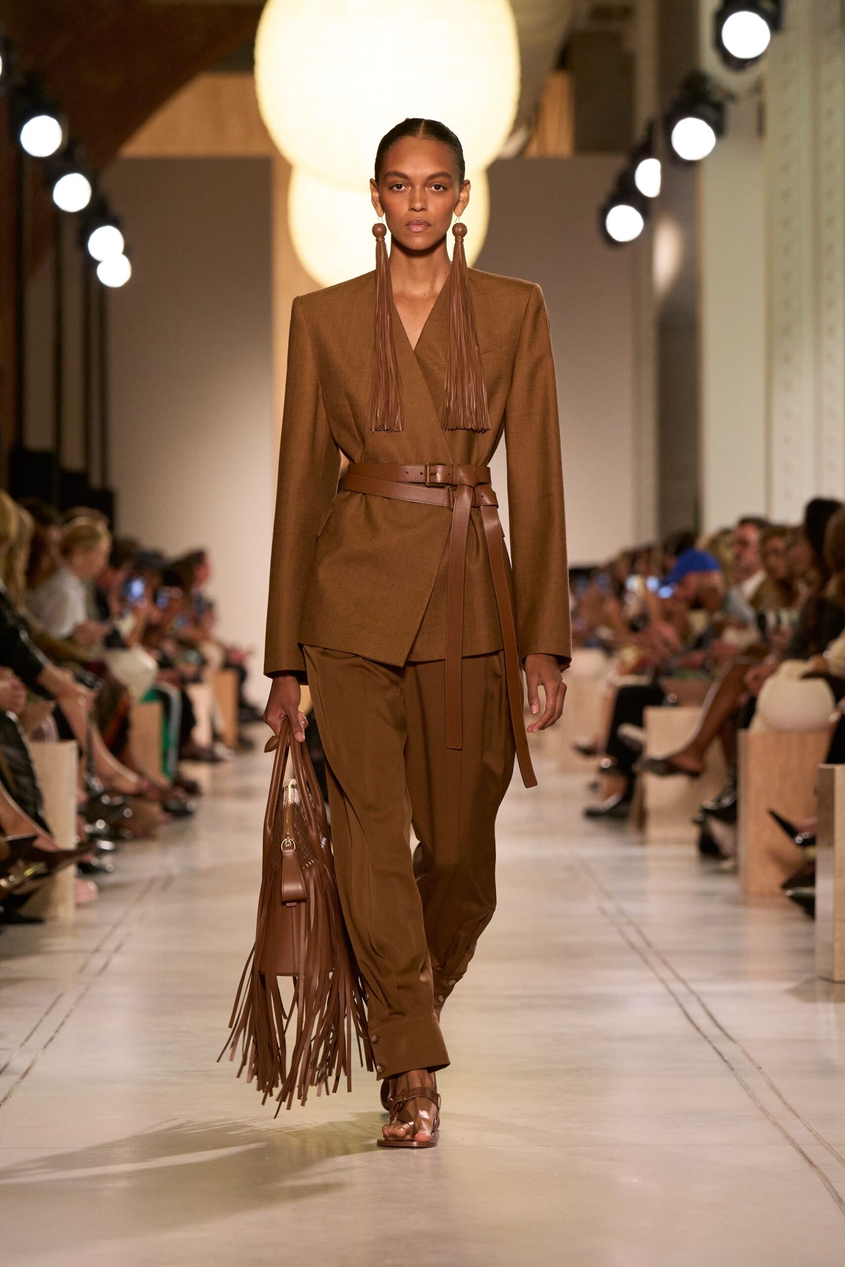 brown tailored blazer with relaxed pants