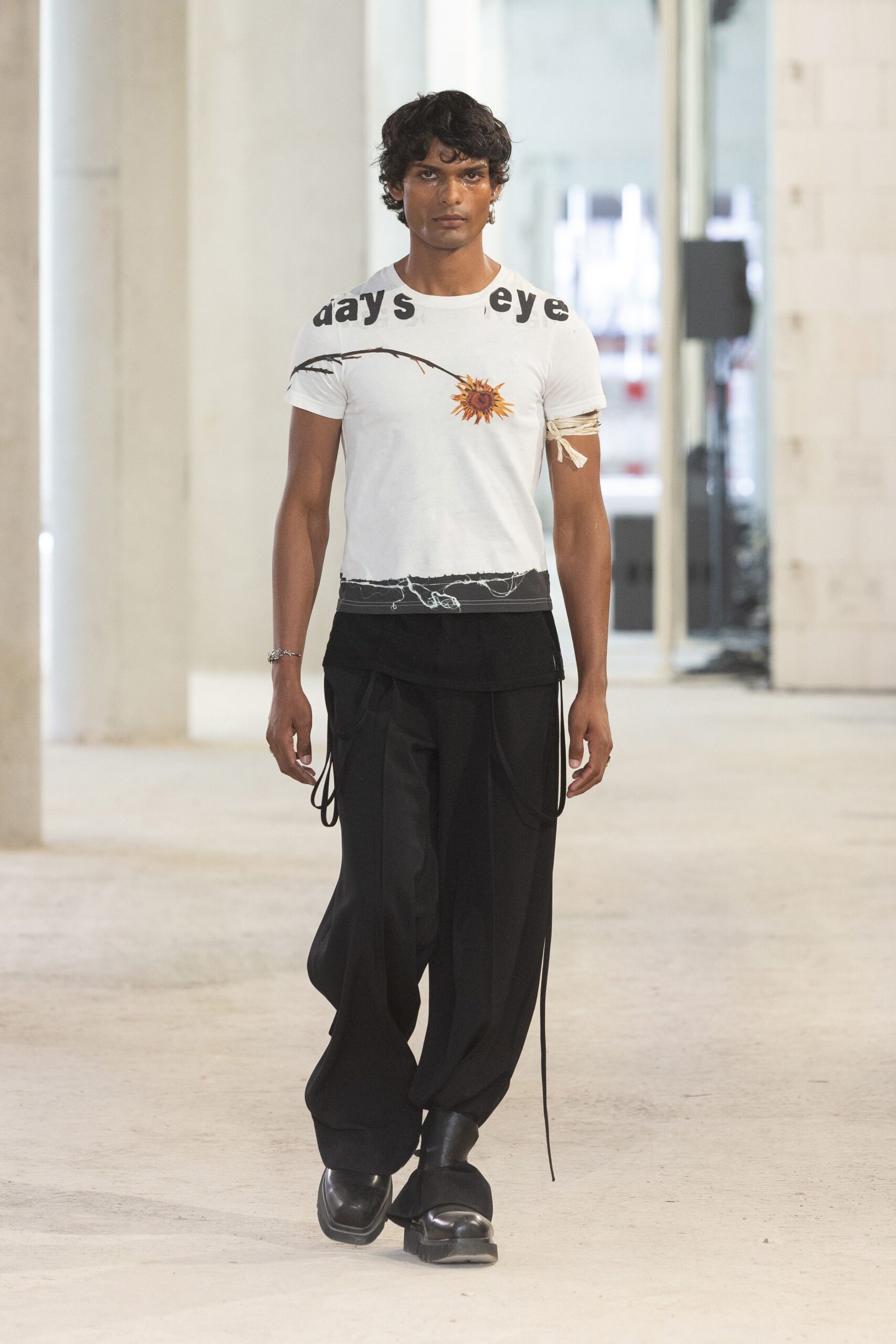 white printed t-shirt black pants