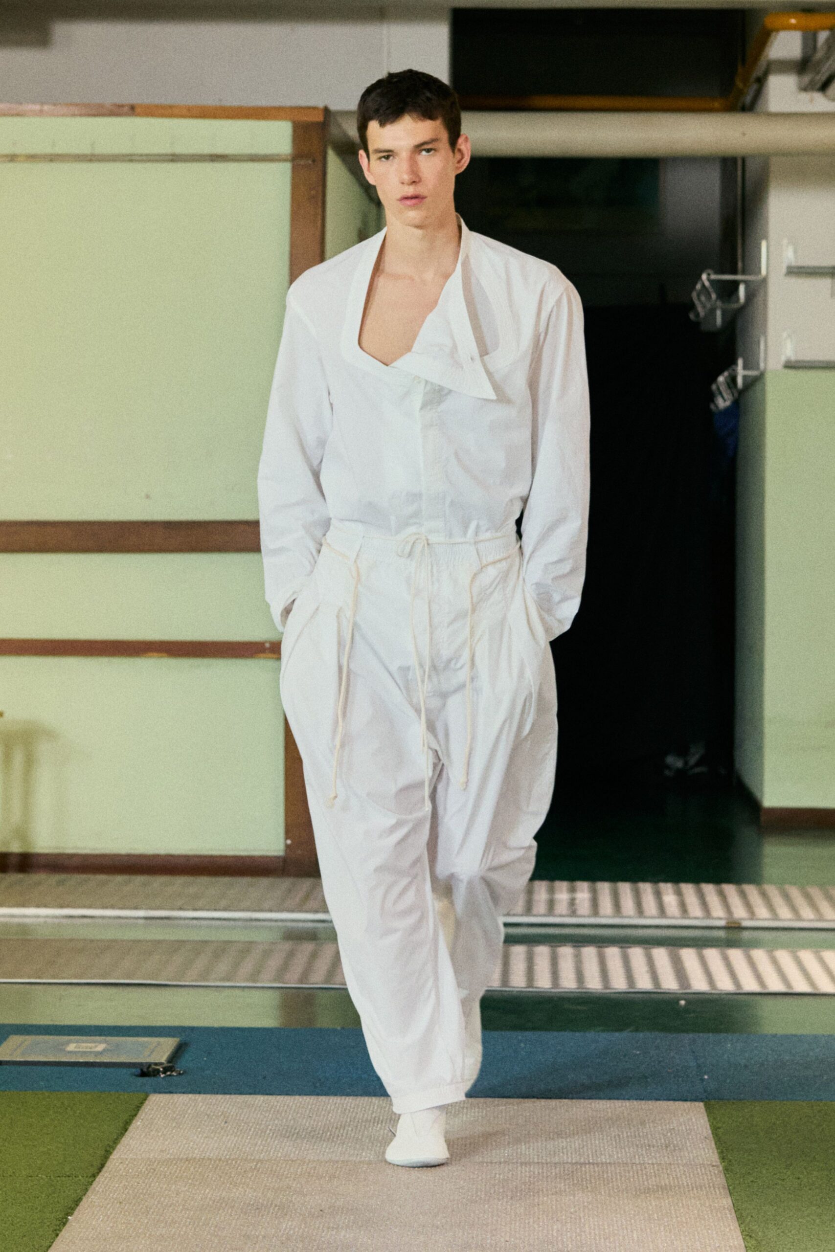 white cotton sleeveless v-neck relaxed zippered jumpsuit