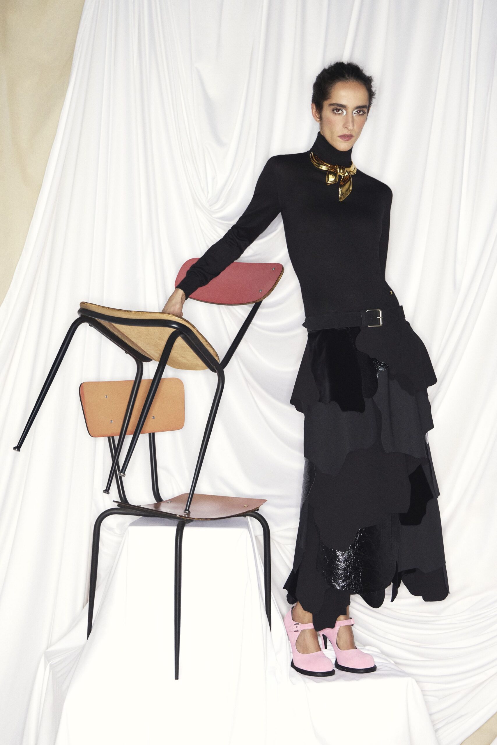 black top and tiered black skirt