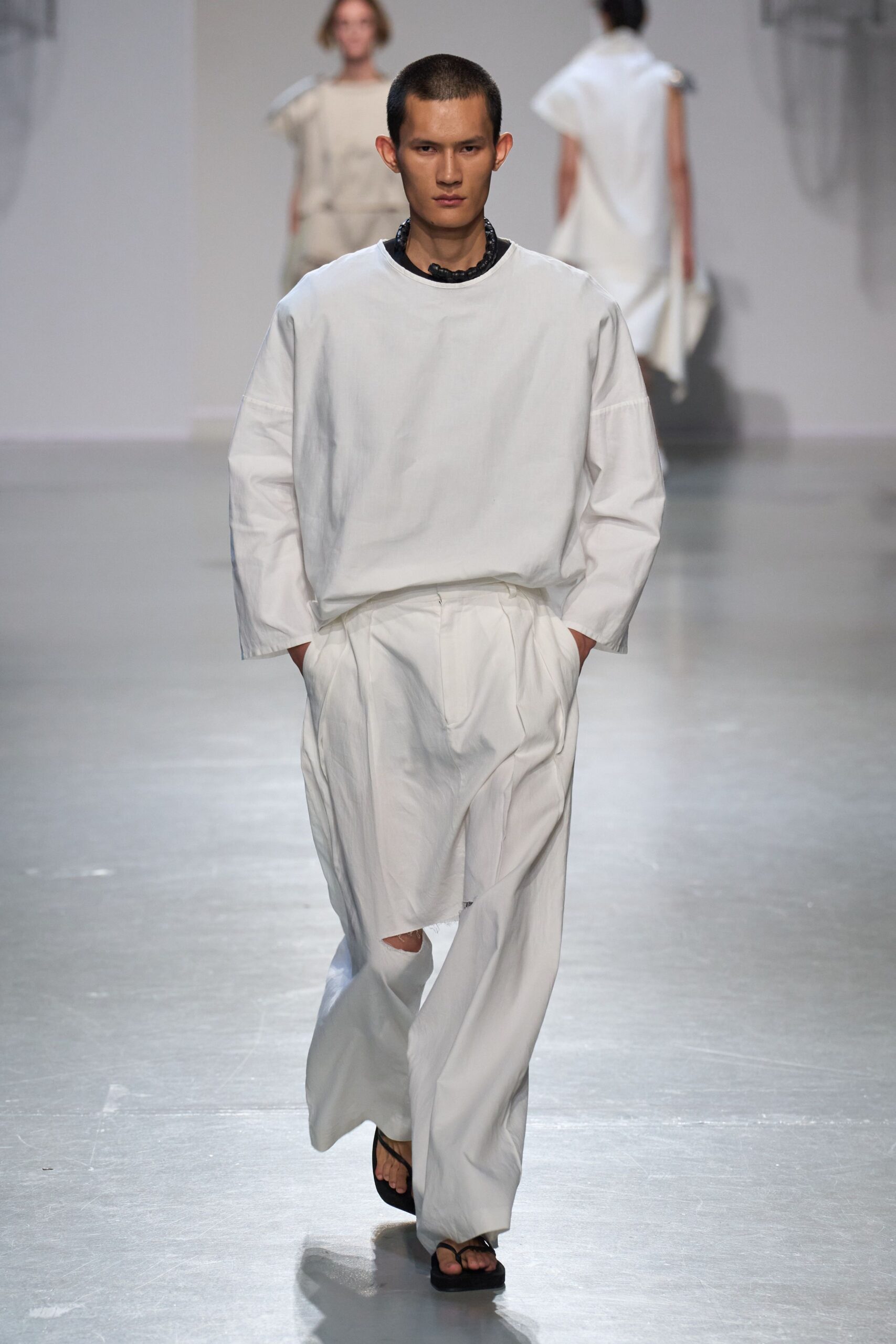 white relaxed top and pants