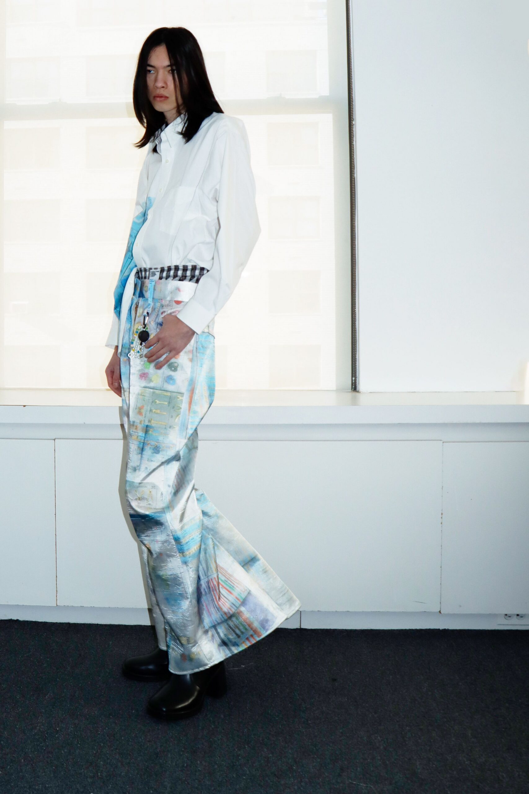 white fitted shirt multi-colored pants