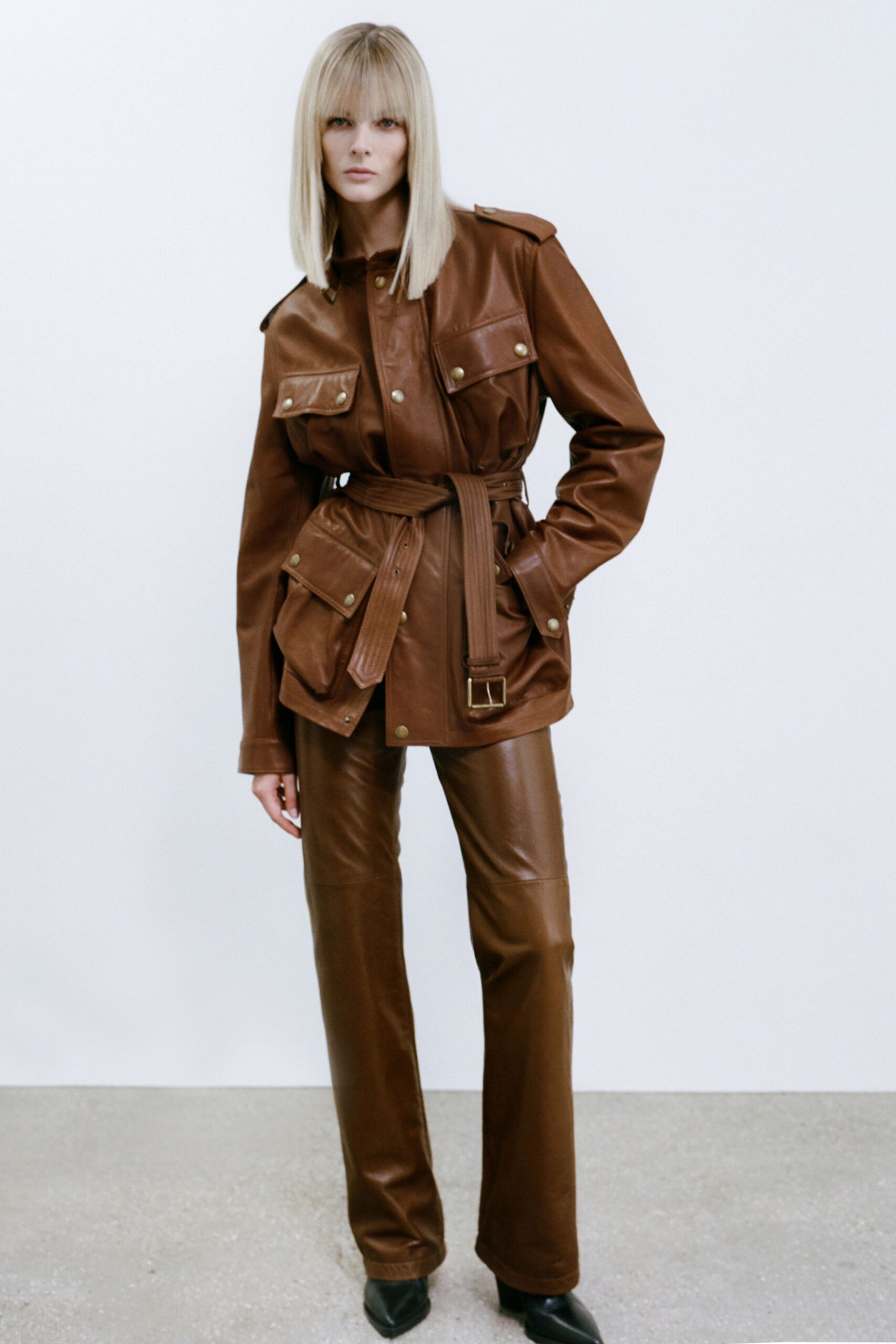 brown leather long-sleeve collared fitted buttoned belted jacket