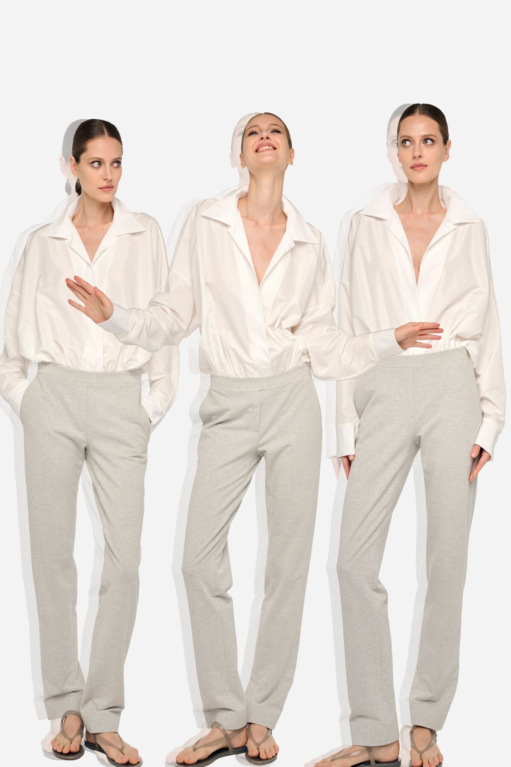 white relaxed shirt gray pants