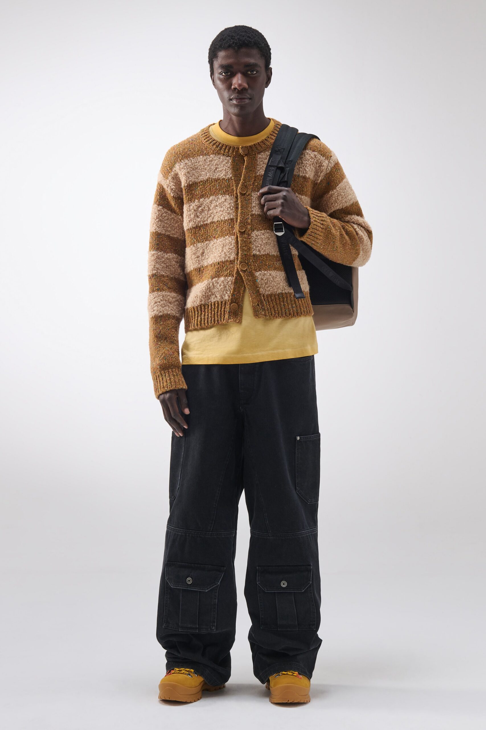 brown striped sweater with cargo pants