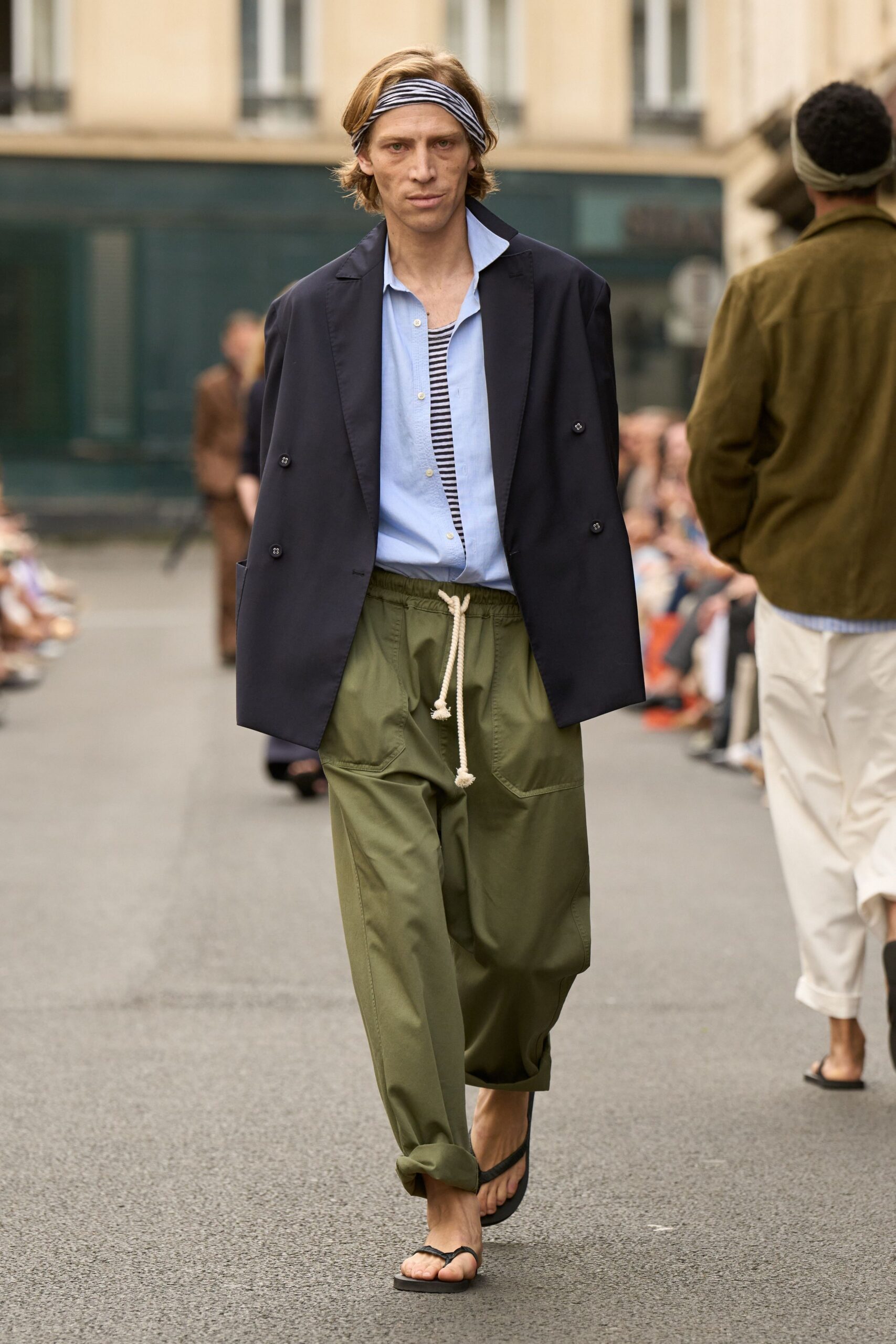 black blazer blue shirt green pants
