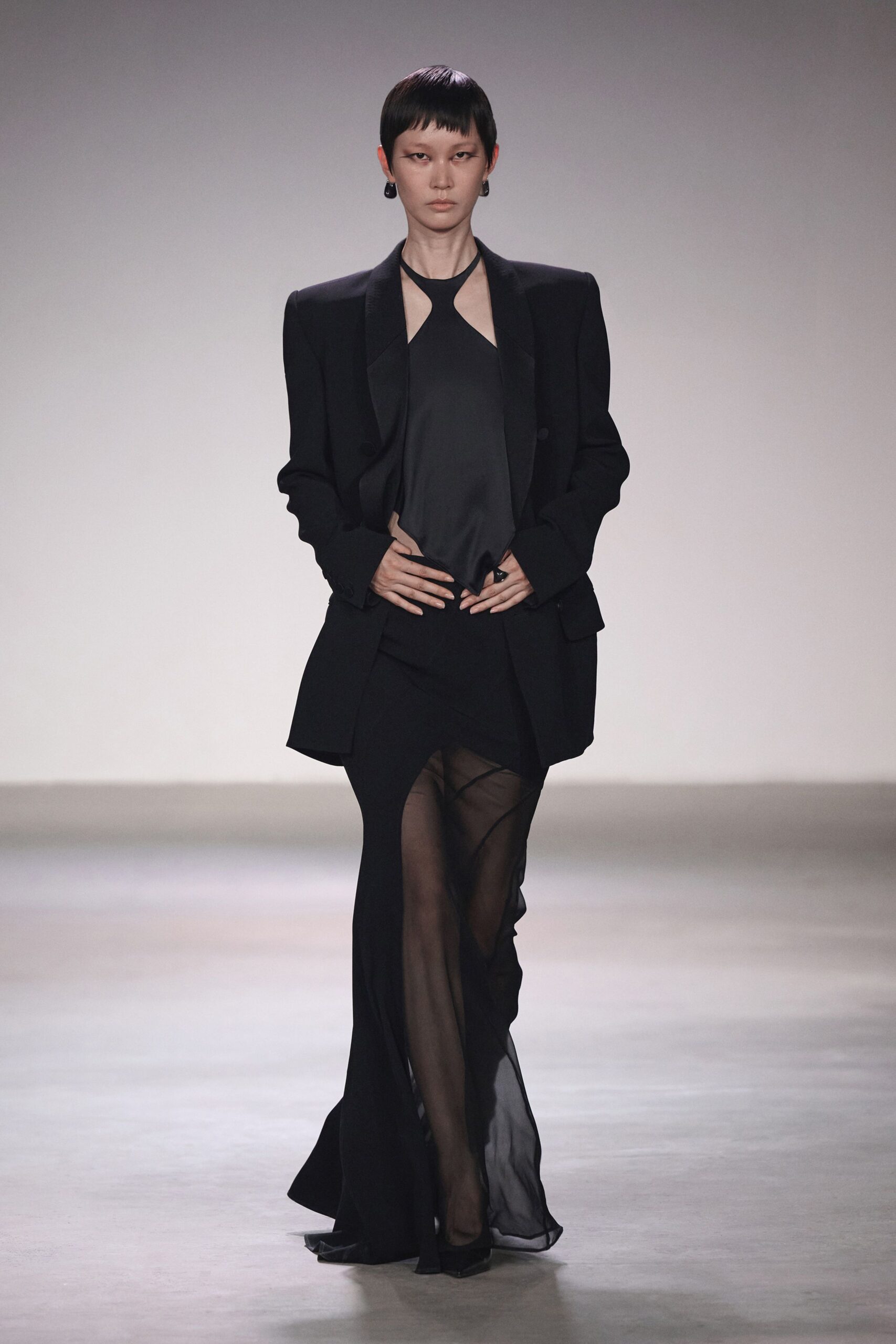 black blazer gray top sheer skirt