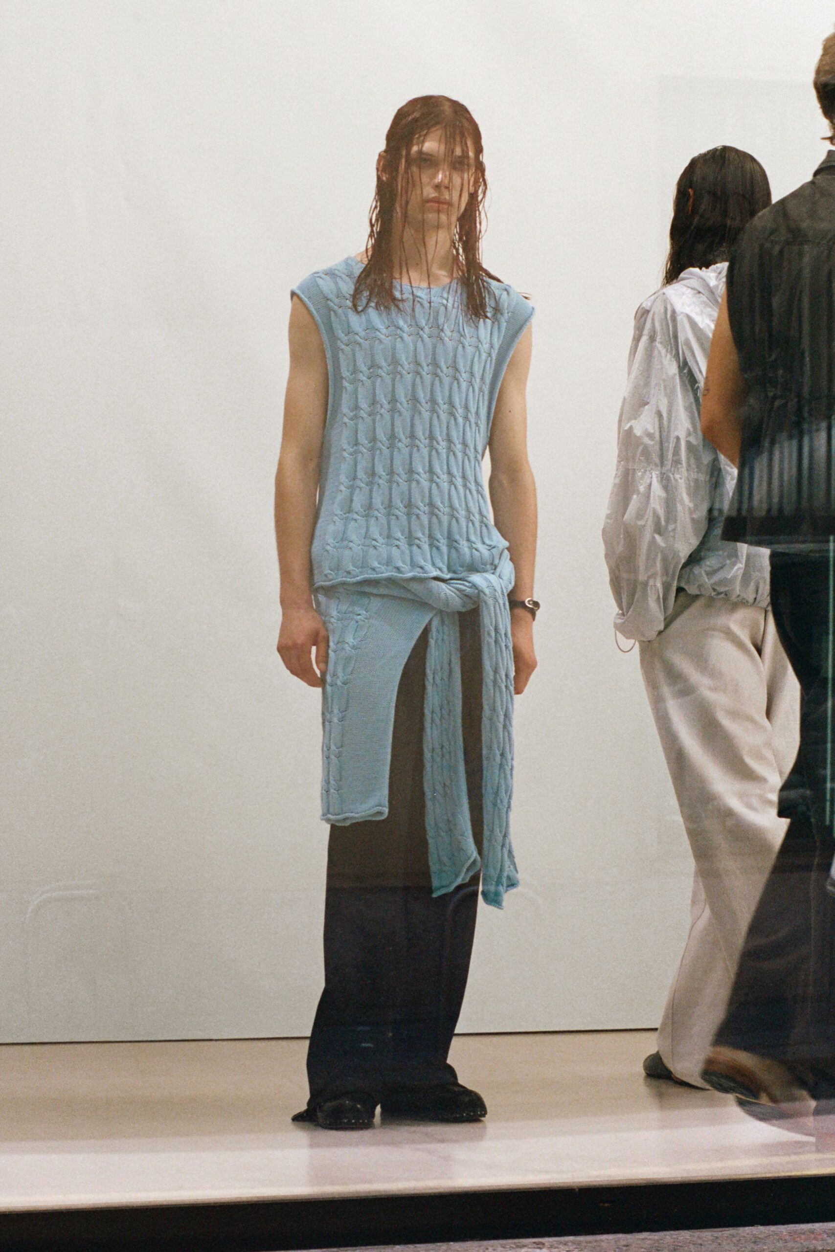 blue relaxed top with black pants
