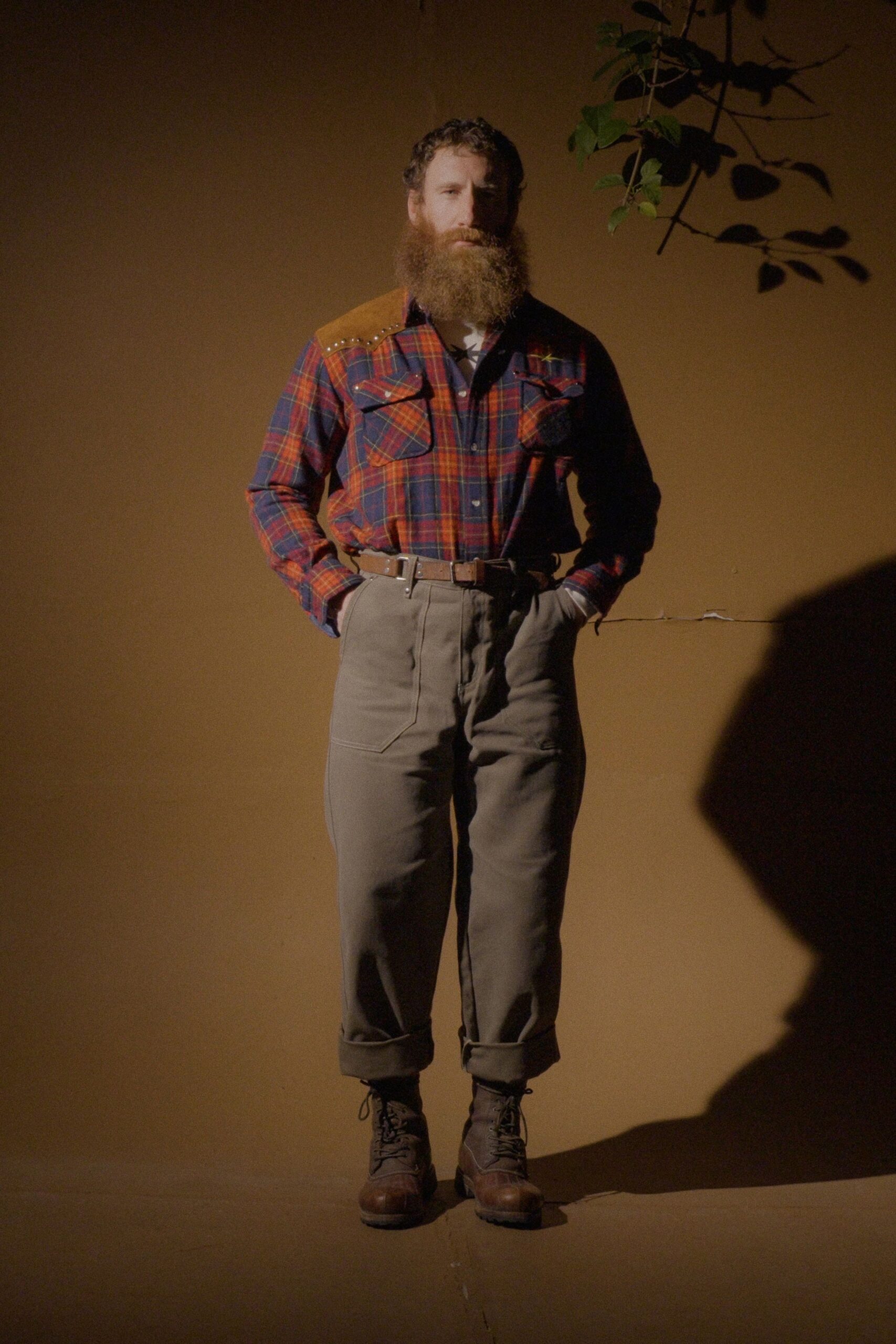 relaxed plaid shirt with beige pants