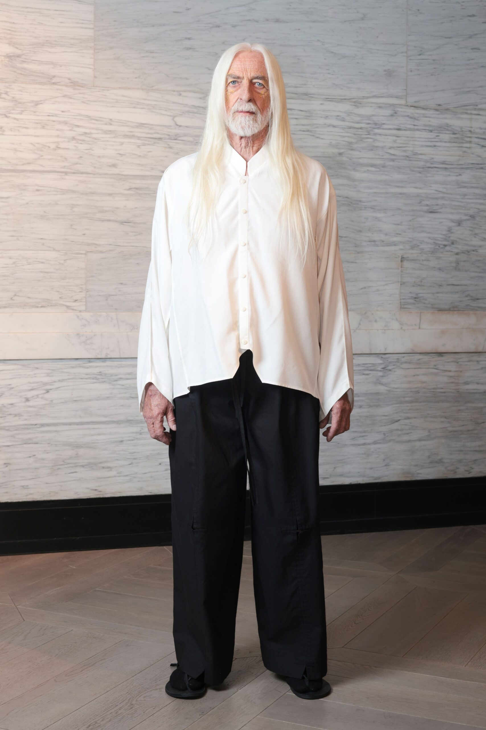 white relaxed shirt black pants