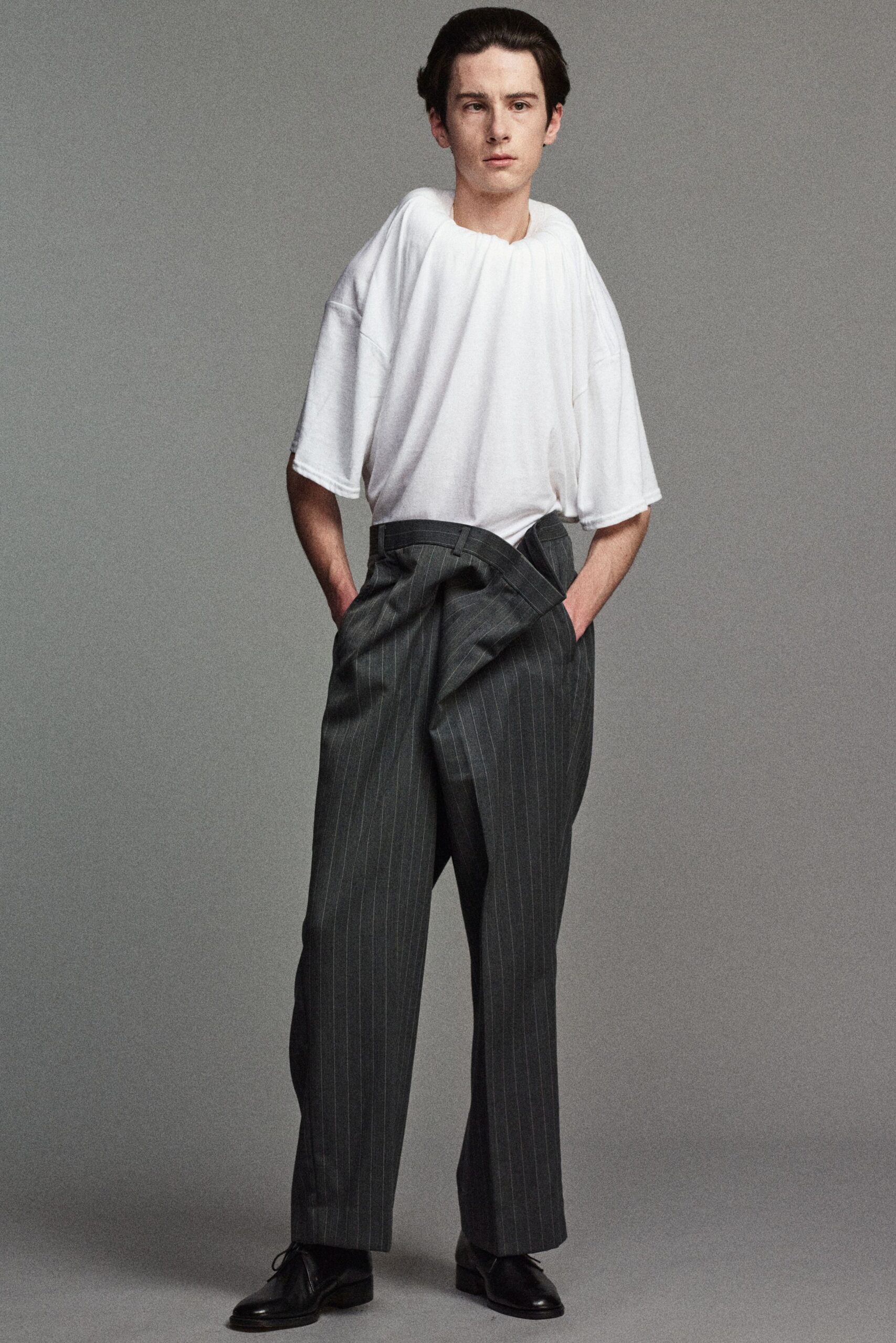 white relaxed top gray tailored pants