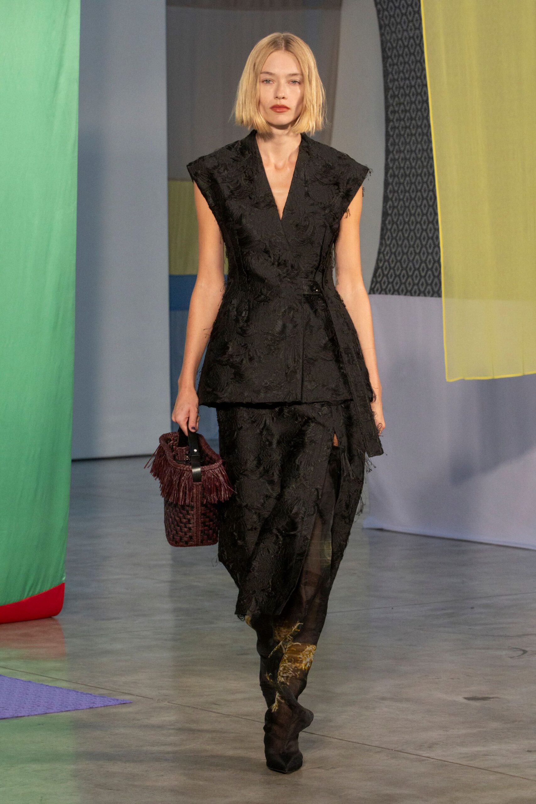 black embroidered midi dress and bag