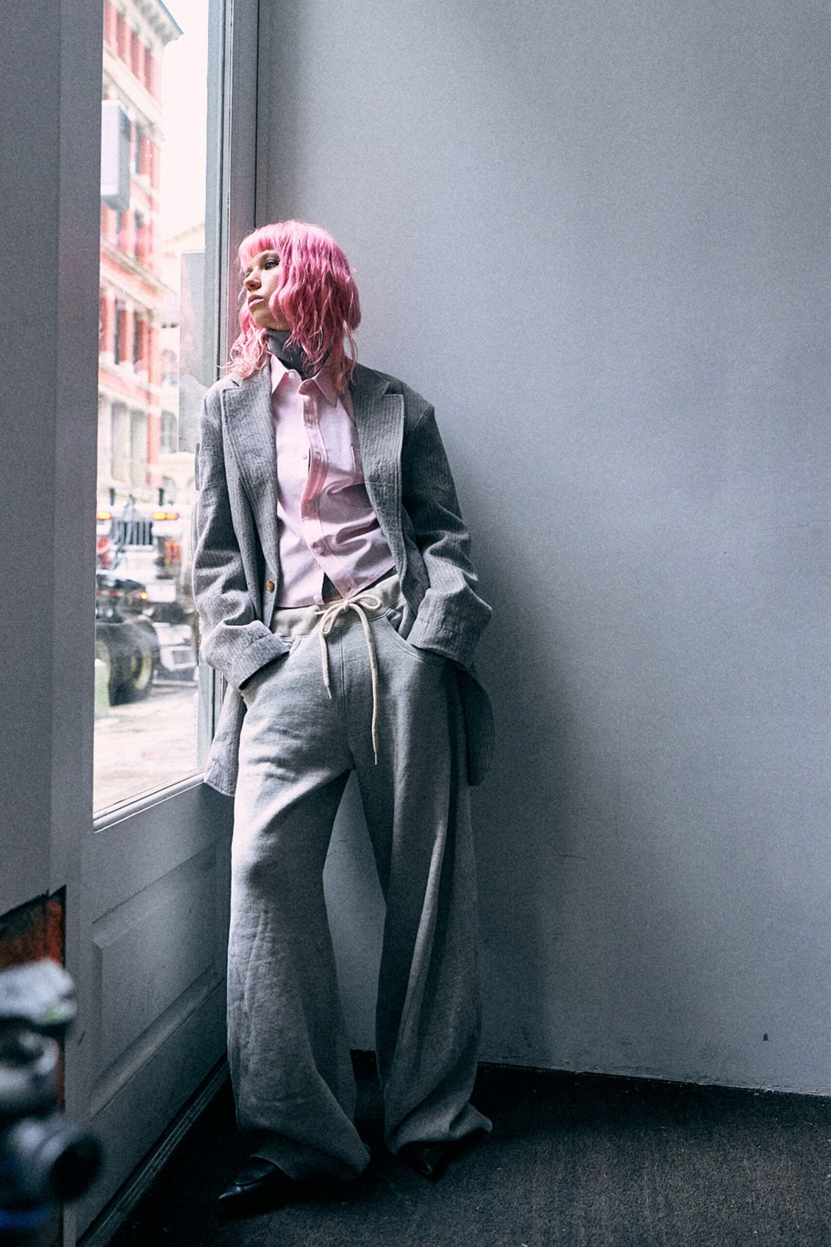 gray tailored blazer with pink shirt