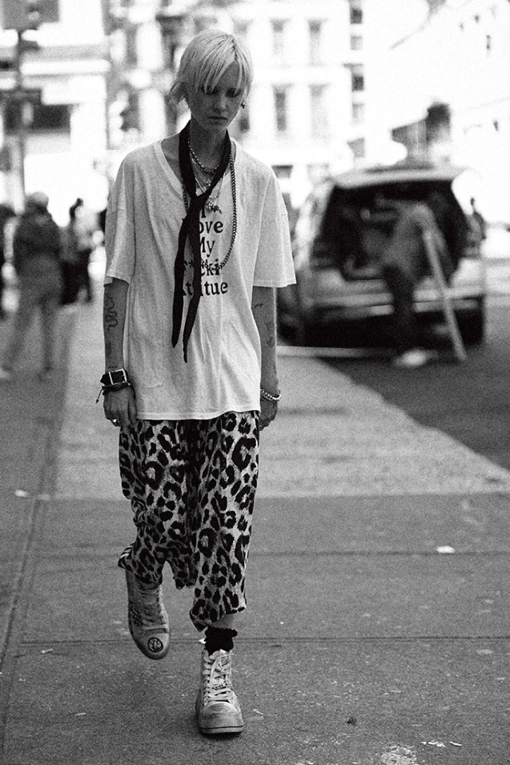 white relaxed t-shirt with animal-print pants