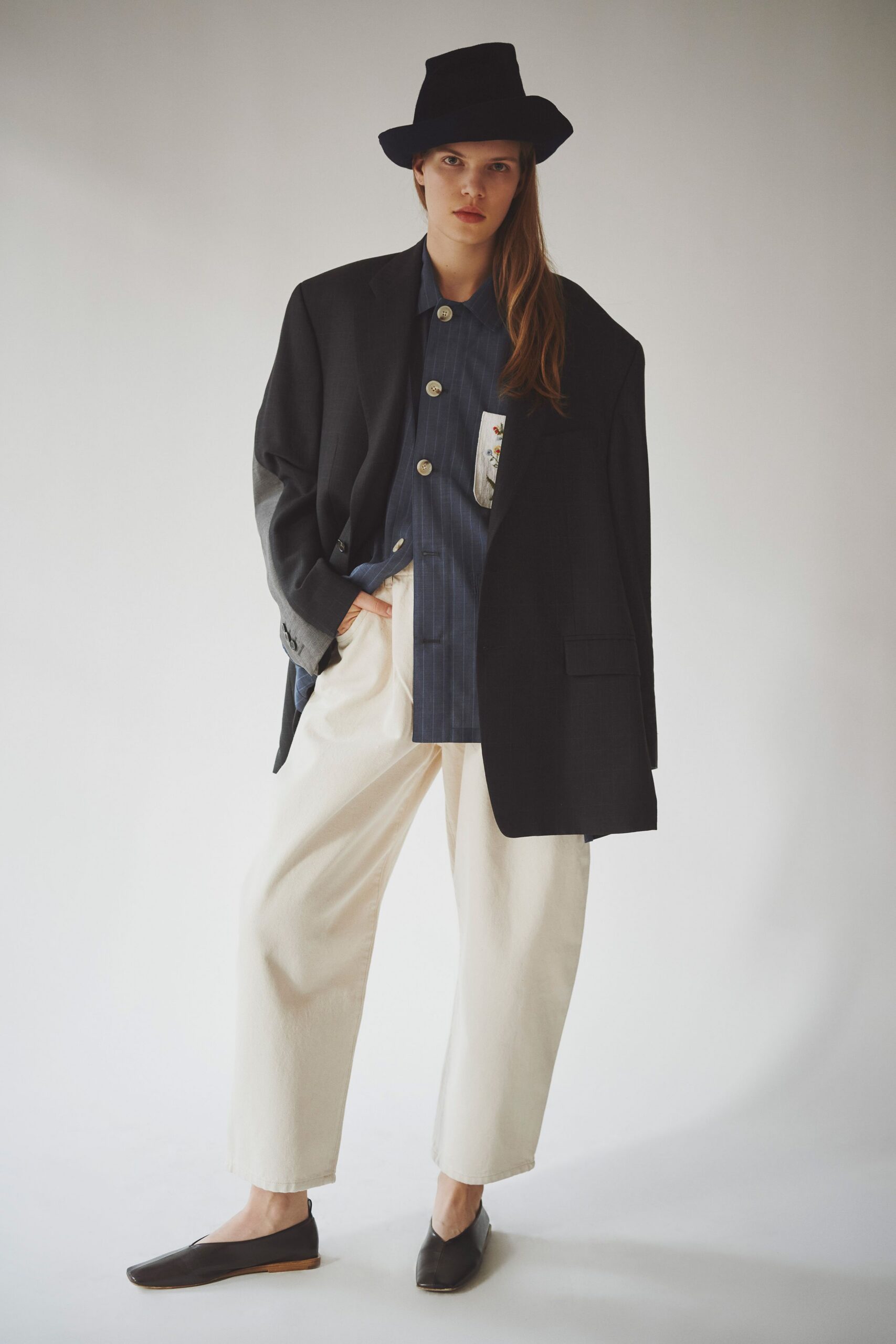 black wool long-sleeve collared oversized buttoned blazer