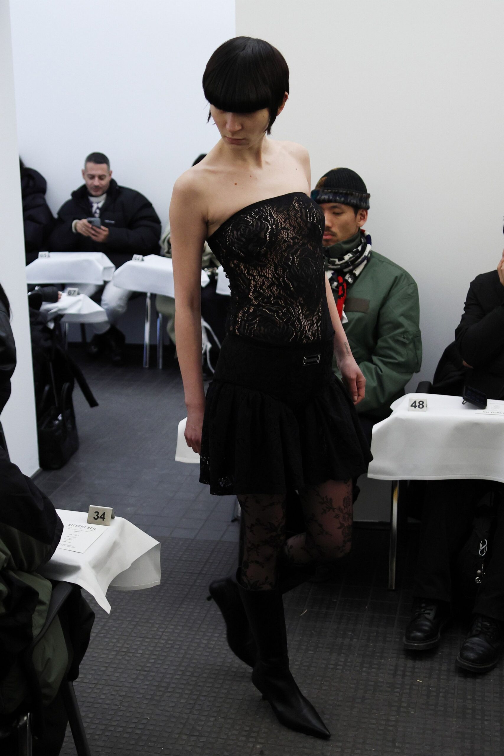 black lace strapless fitted ruffled mini dress
