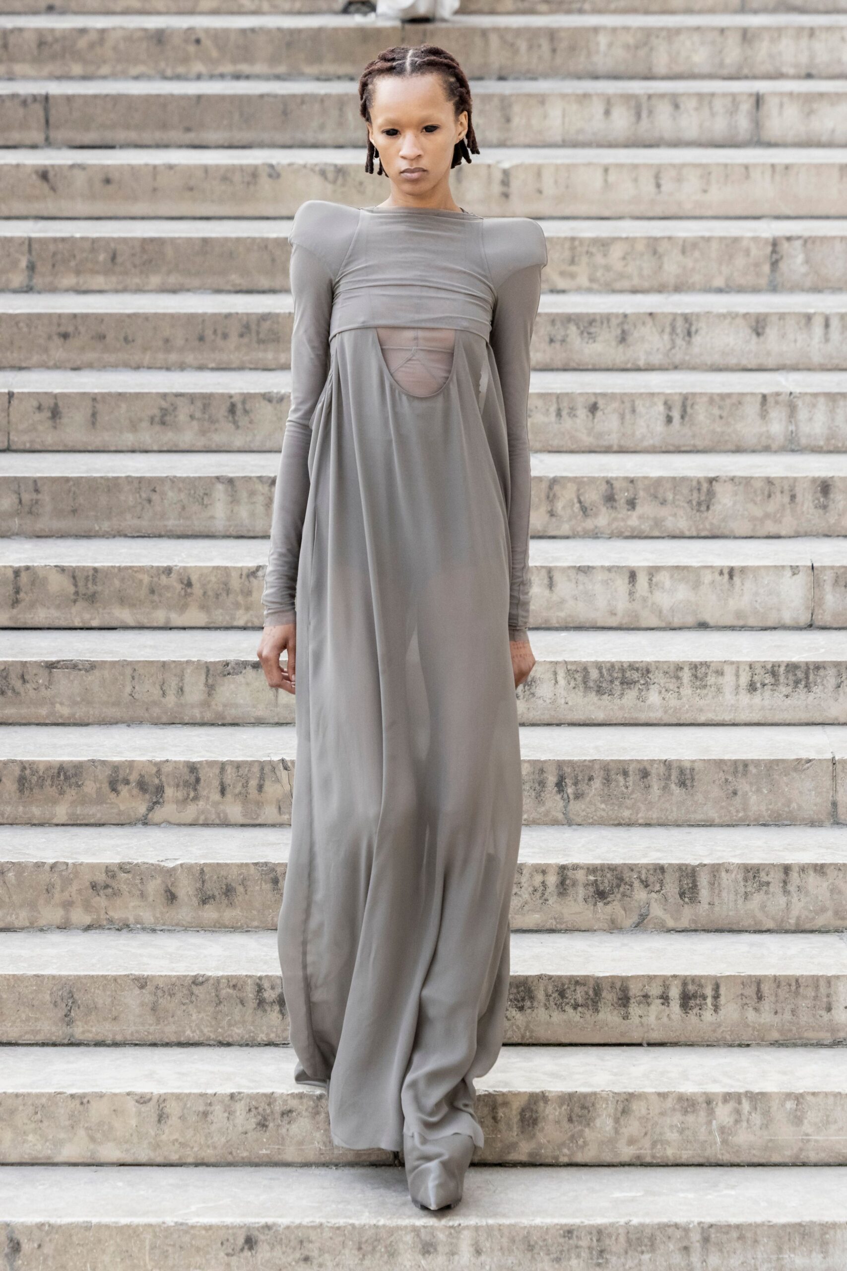 gray silk long-sleeve high-neck fitted sheer flowing gown
