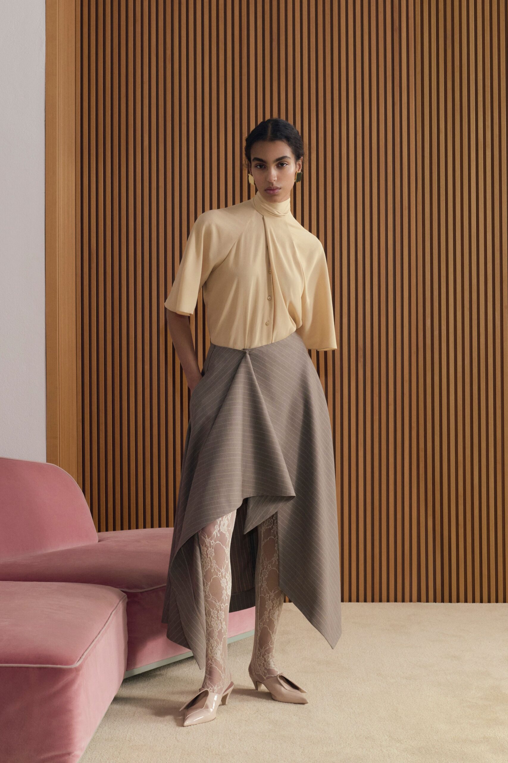 beige shirt gray asymmetric skirt