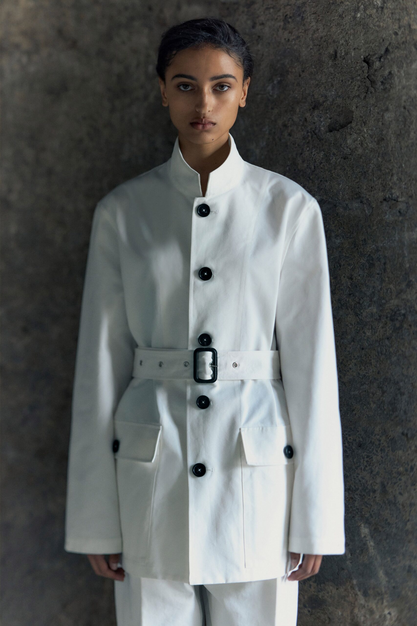 white cotton long-sleeve collared relaxed buttoned belted jacket