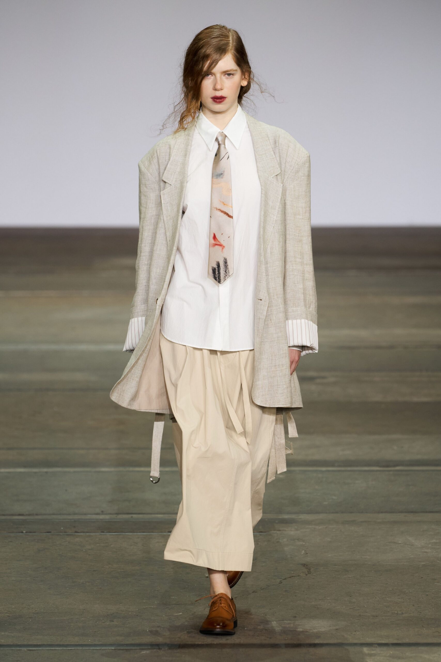 gray blazer white shirt beige pants