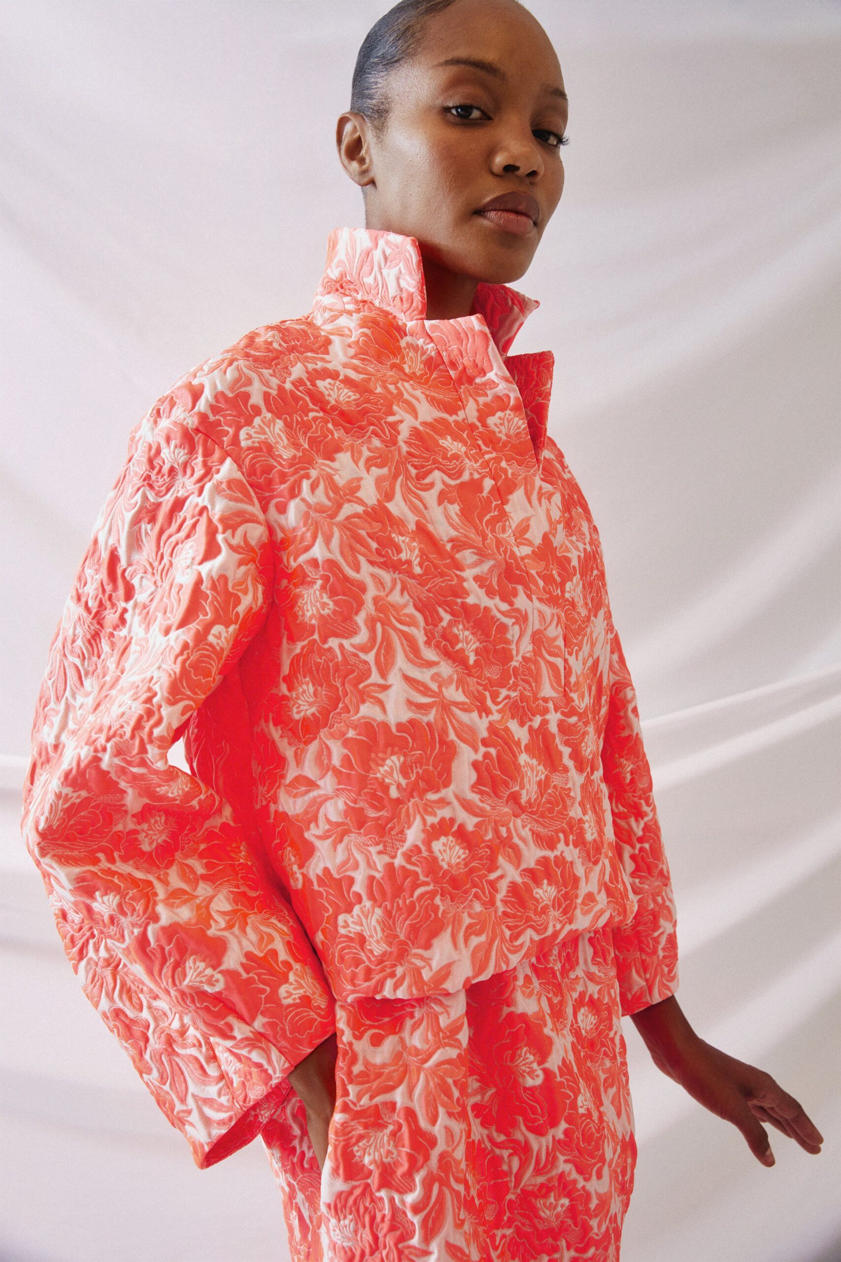 orange cotton long-sleeve collared oversized floral quilted jacket