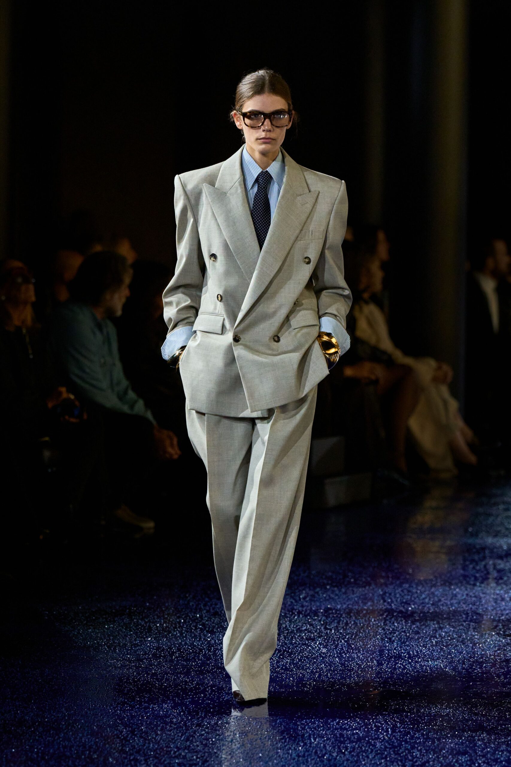 gray tailored suit with blue shirt