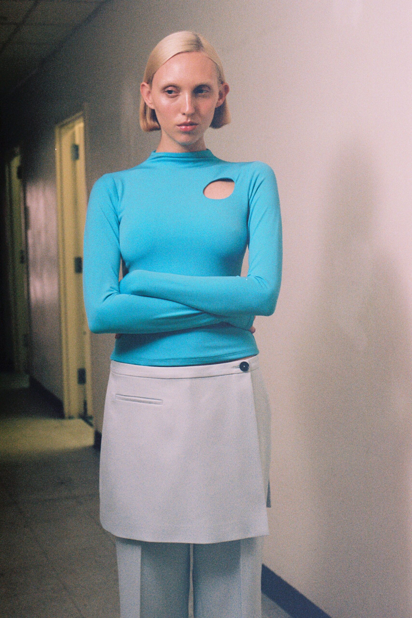 blue cotton long-sleeve high-neck fitted top