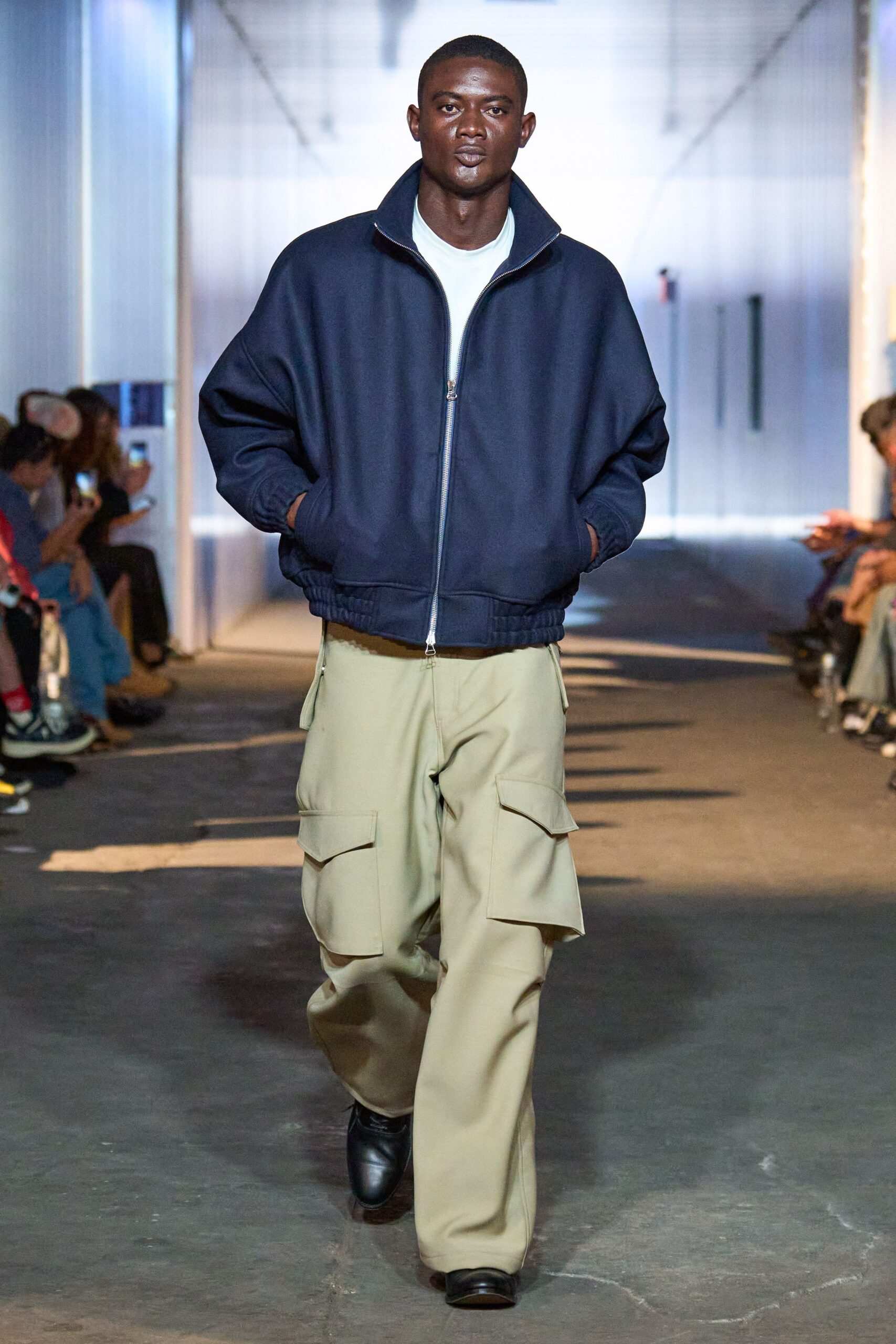 navy jacket white t-shirt beige cargo pants