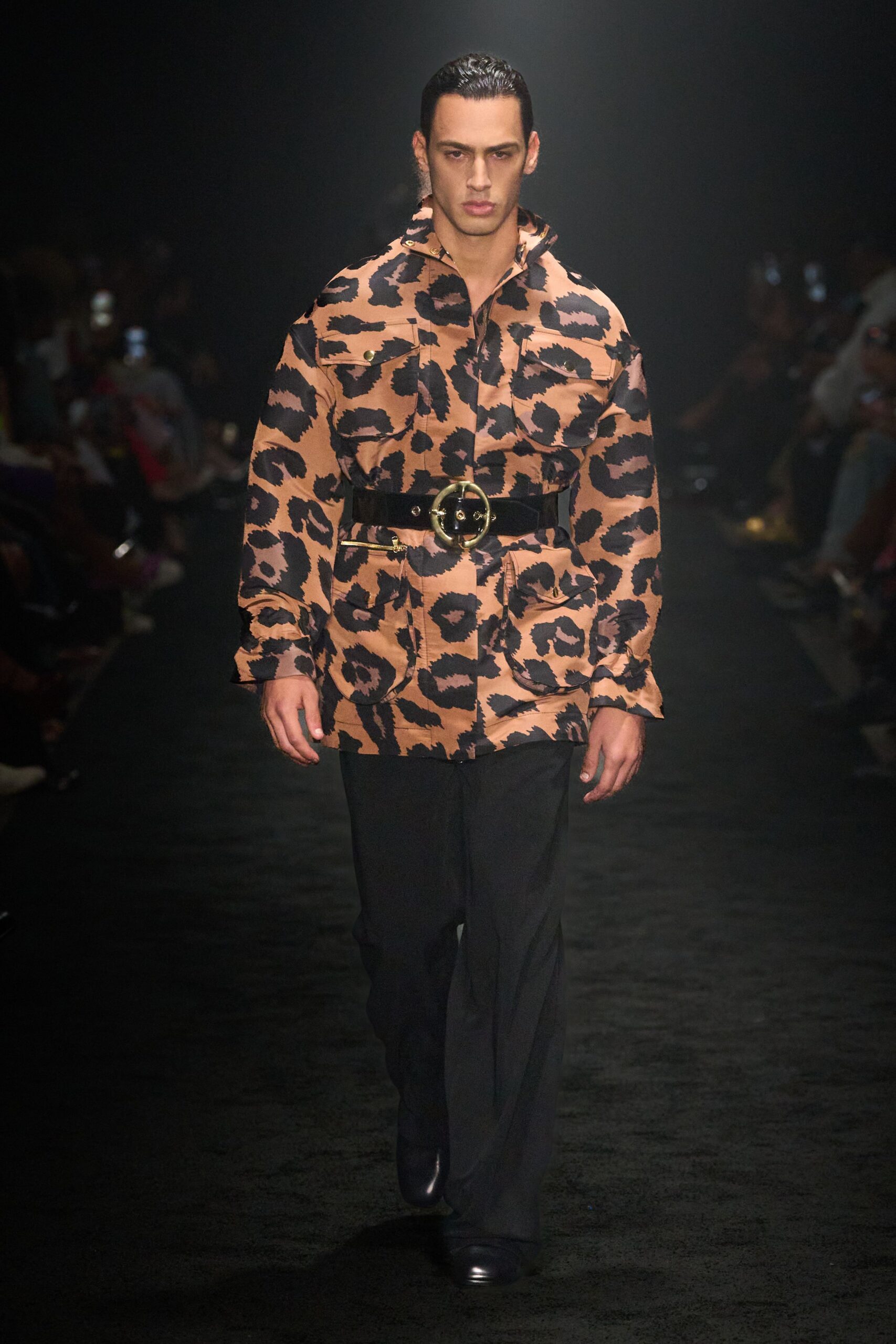 orange black animal-print shirt with black pants