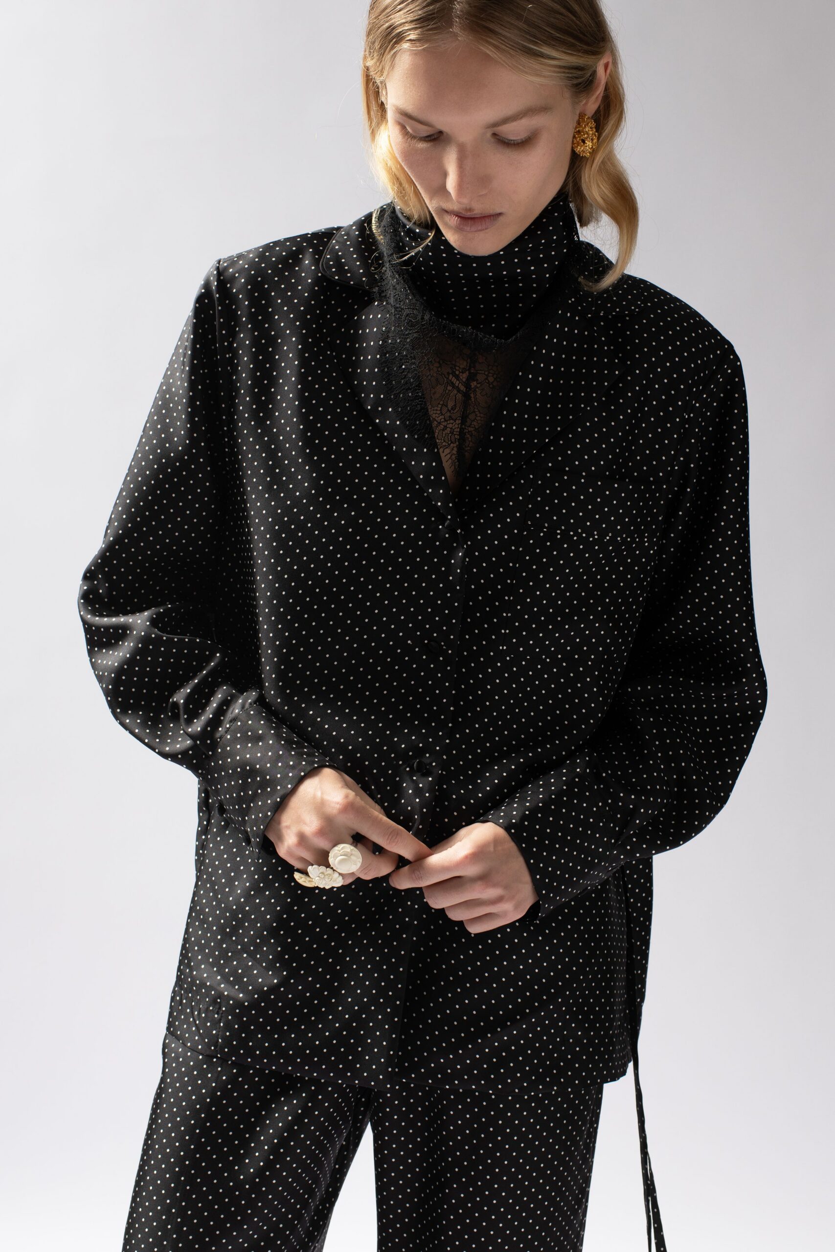 black polka-dot silk shirt and pants