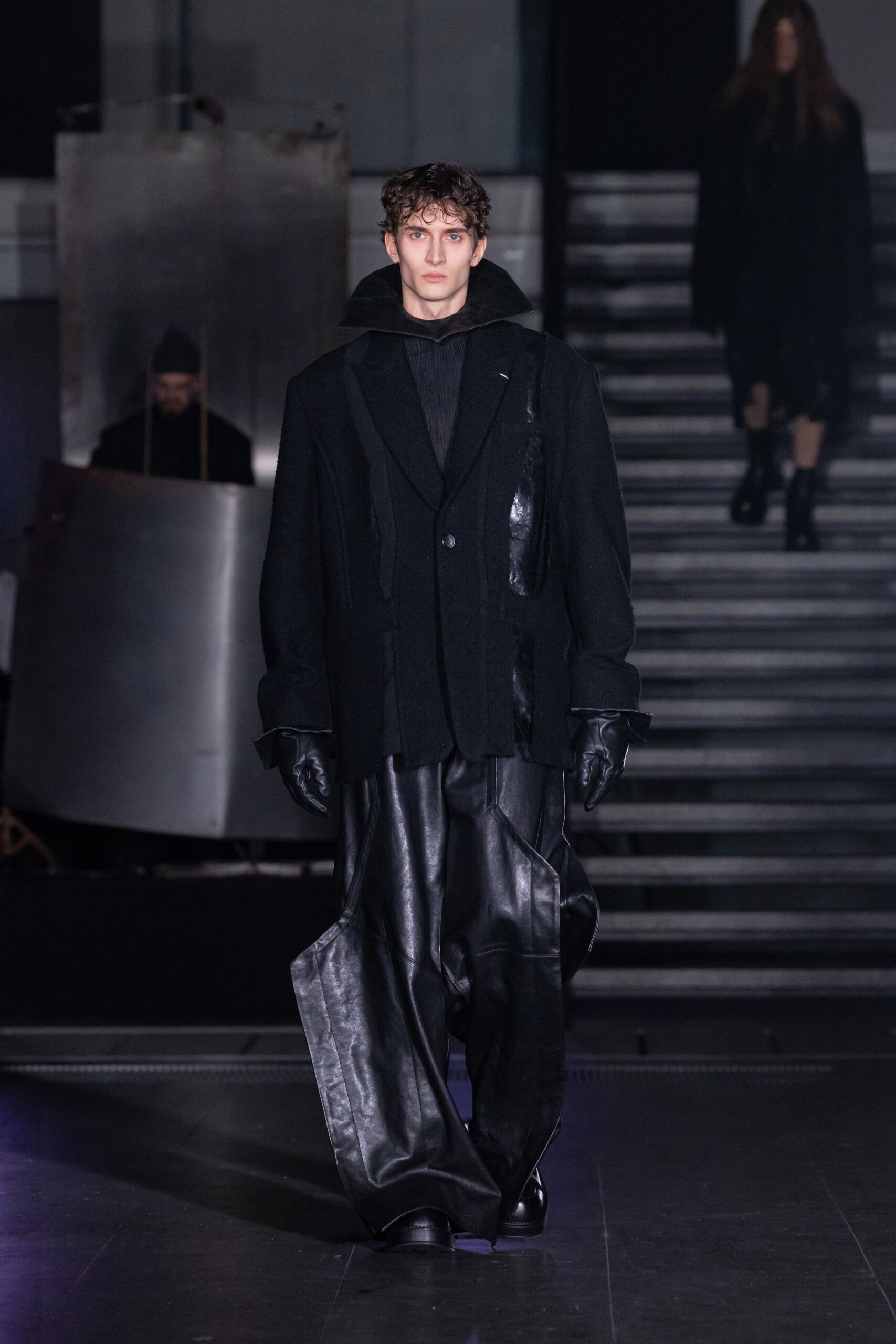 black leather long-sleeve collared oversized layered coat