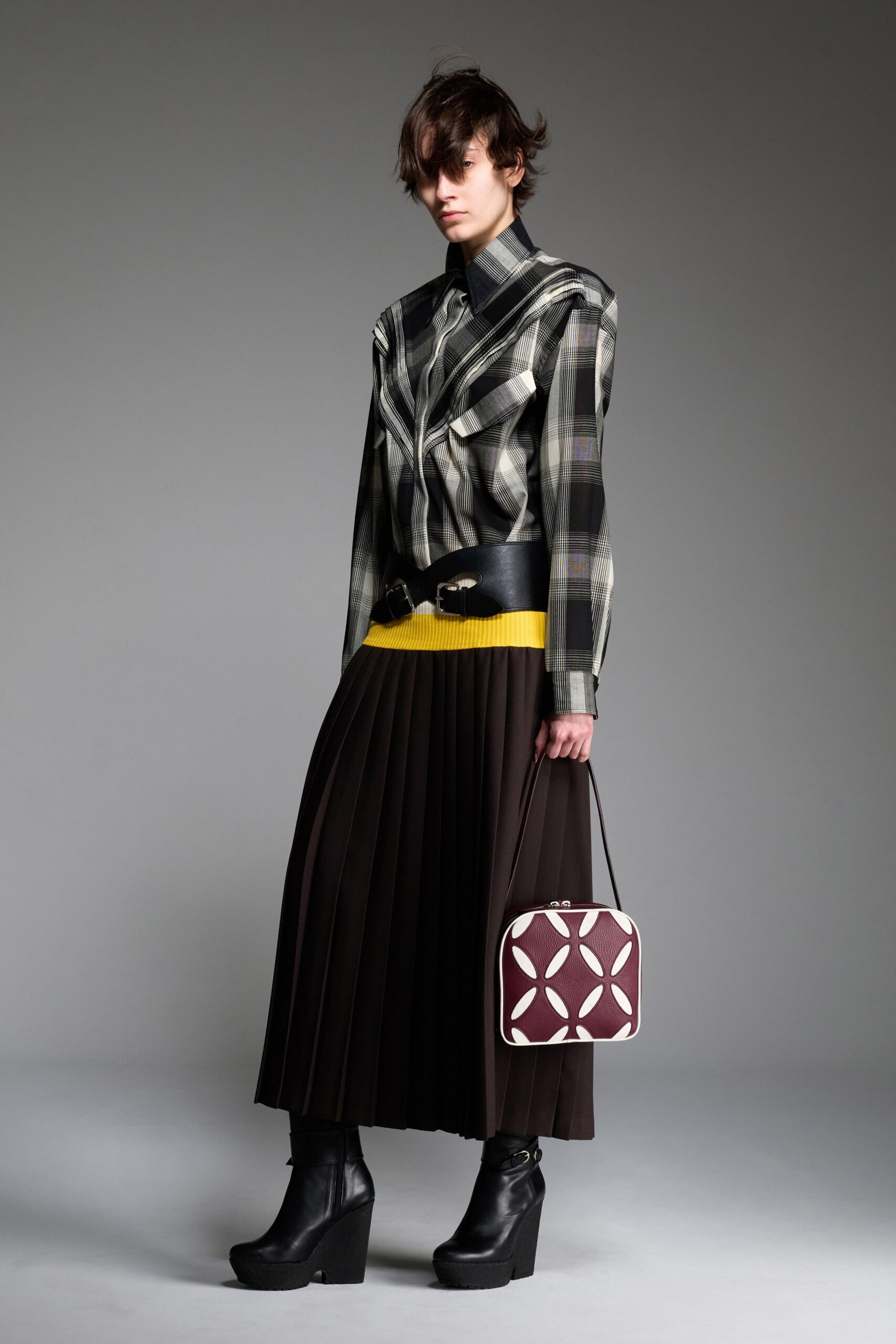 checked shirt and pleated skirt