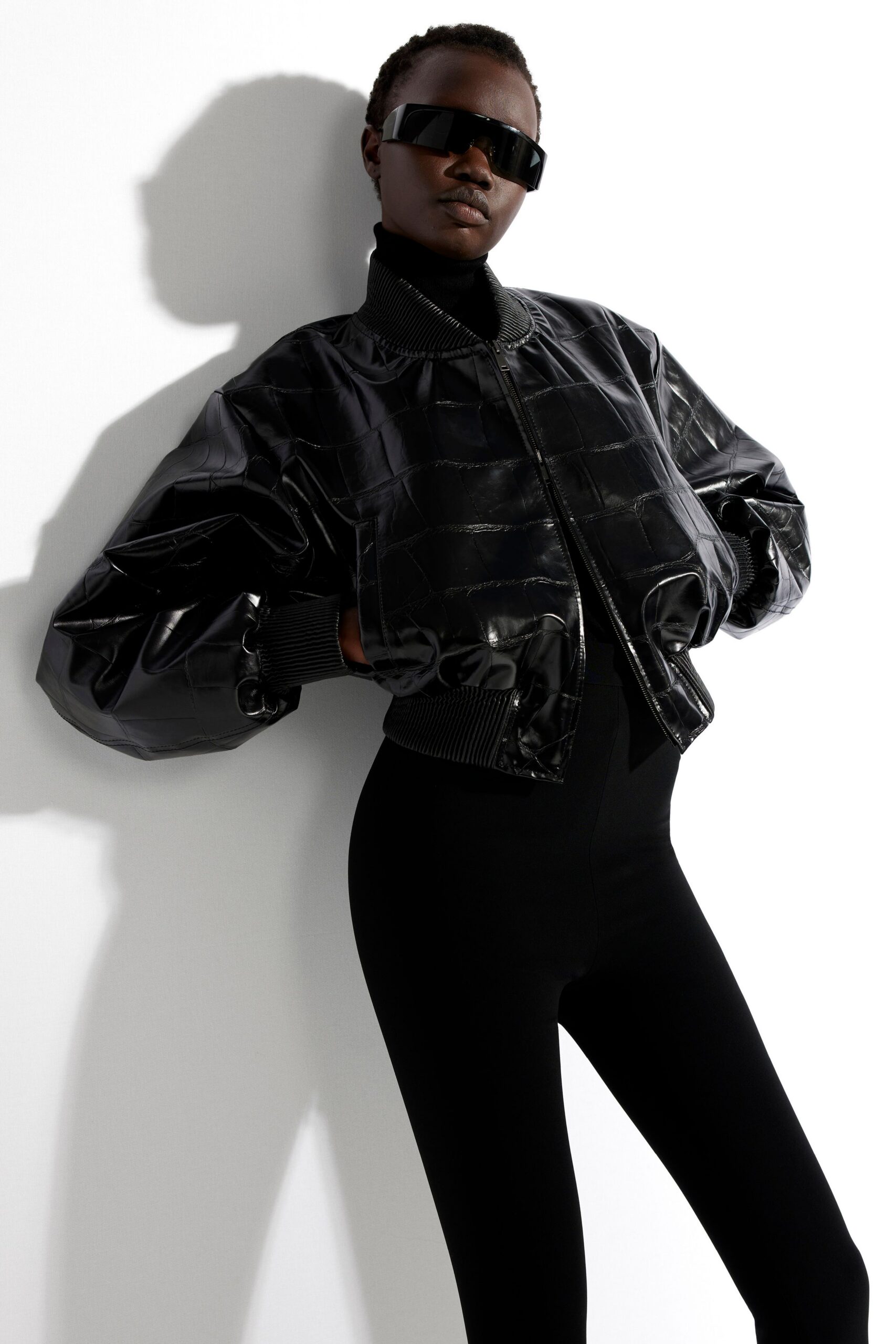 black vinyl long-sleeve collared fitted zippered shiny jacket