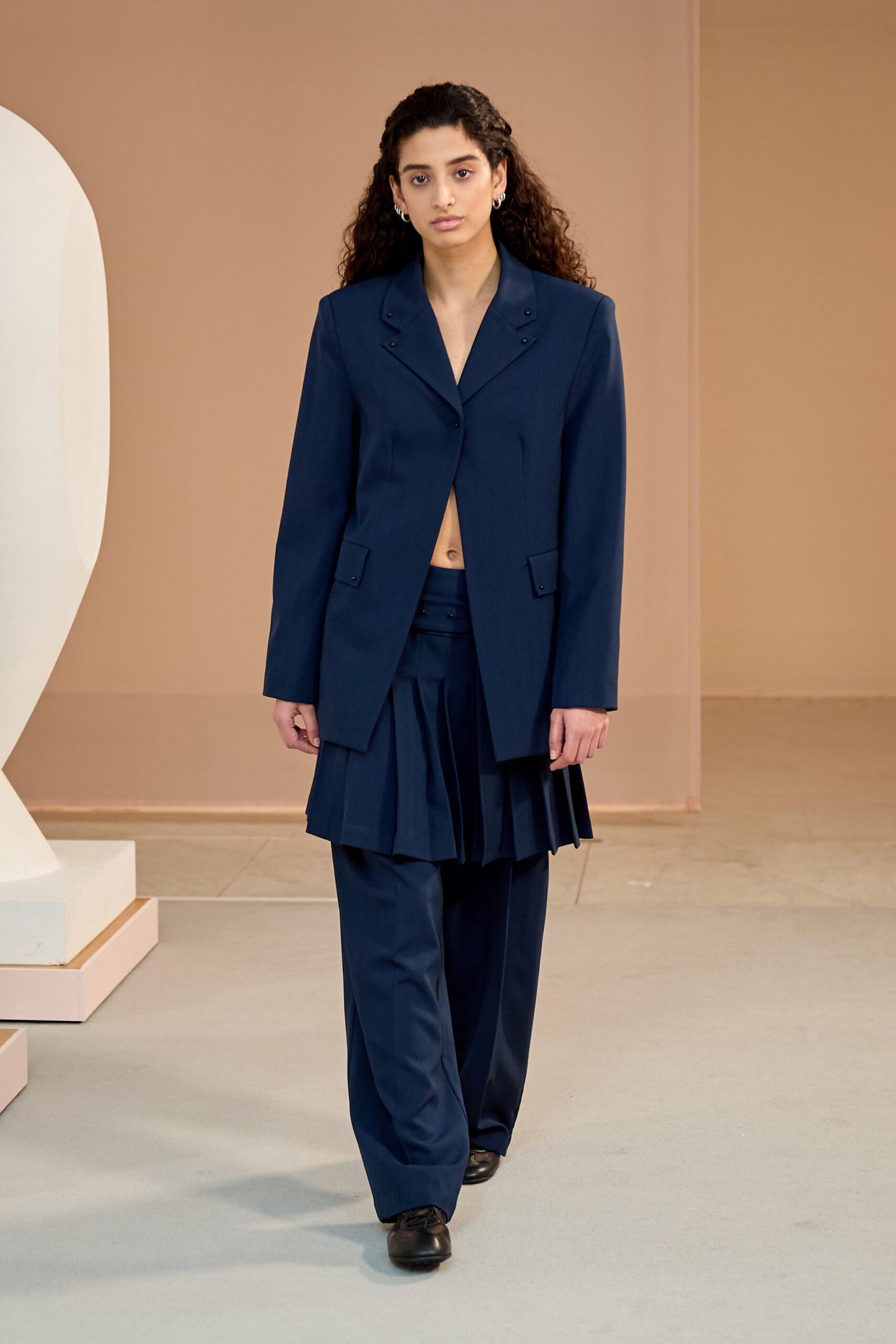 blue blazer with pleated skirt
