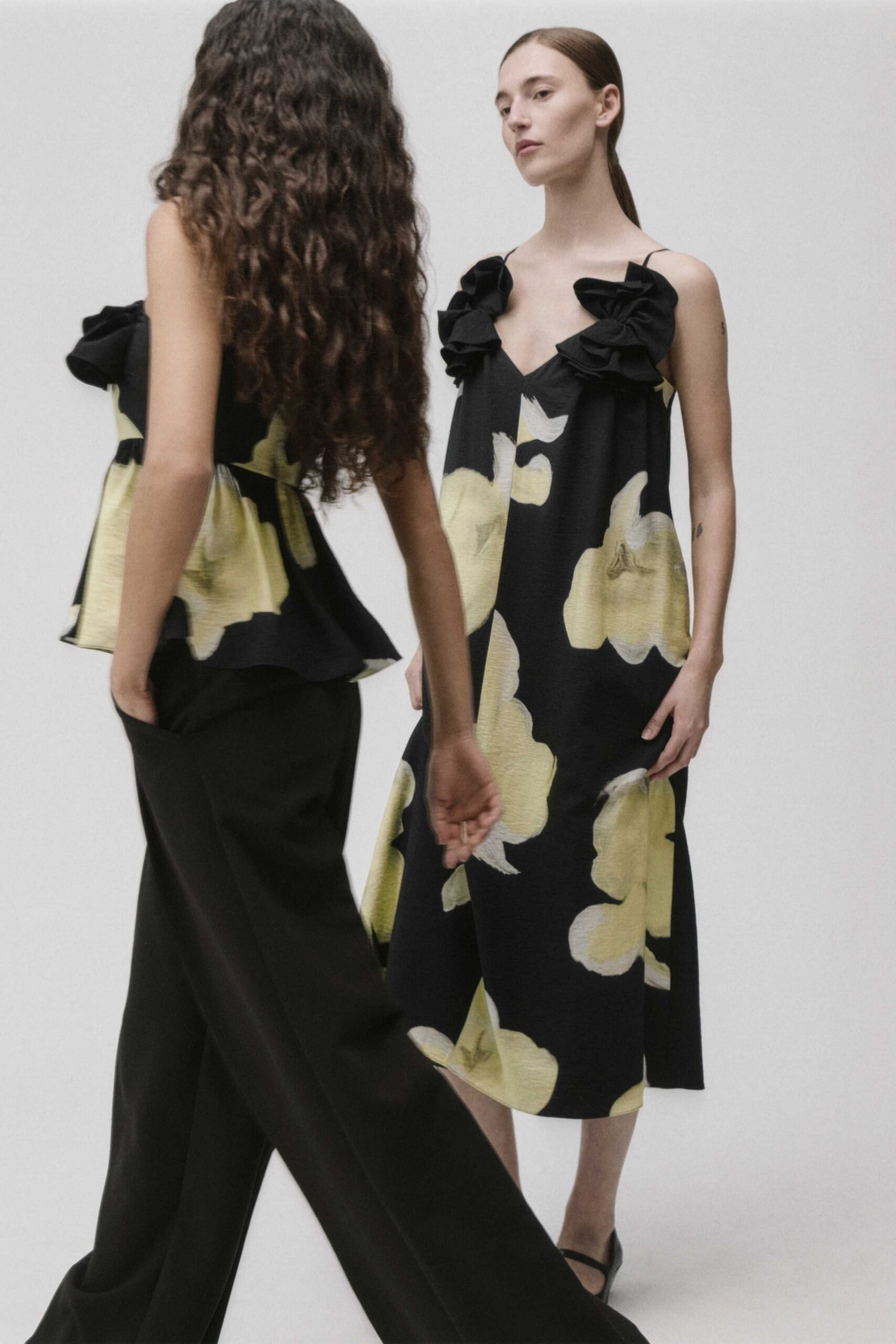 black cotton sleeveless v-neck relaxed ruffled flared dress