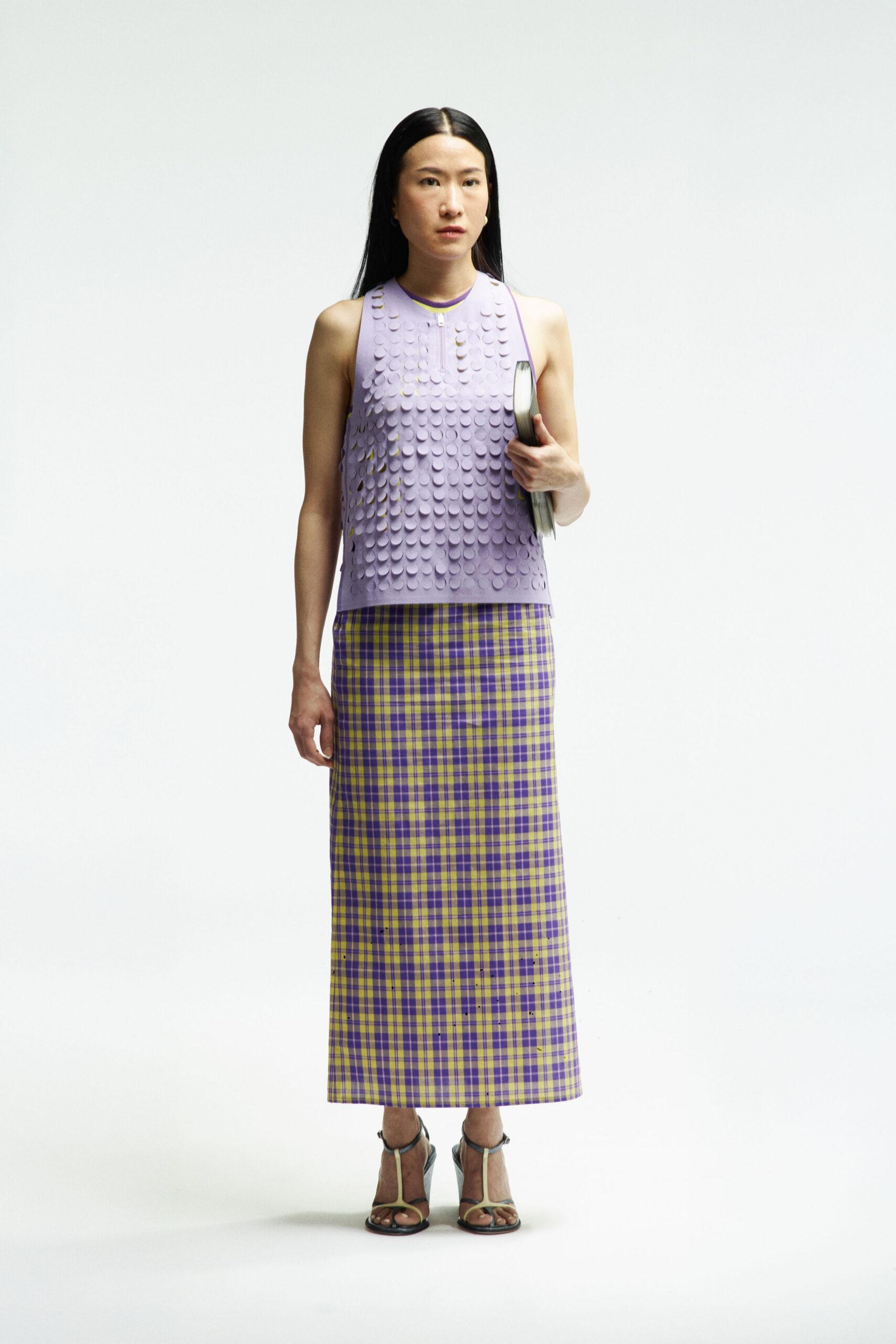 purple pleated top with checked skirt