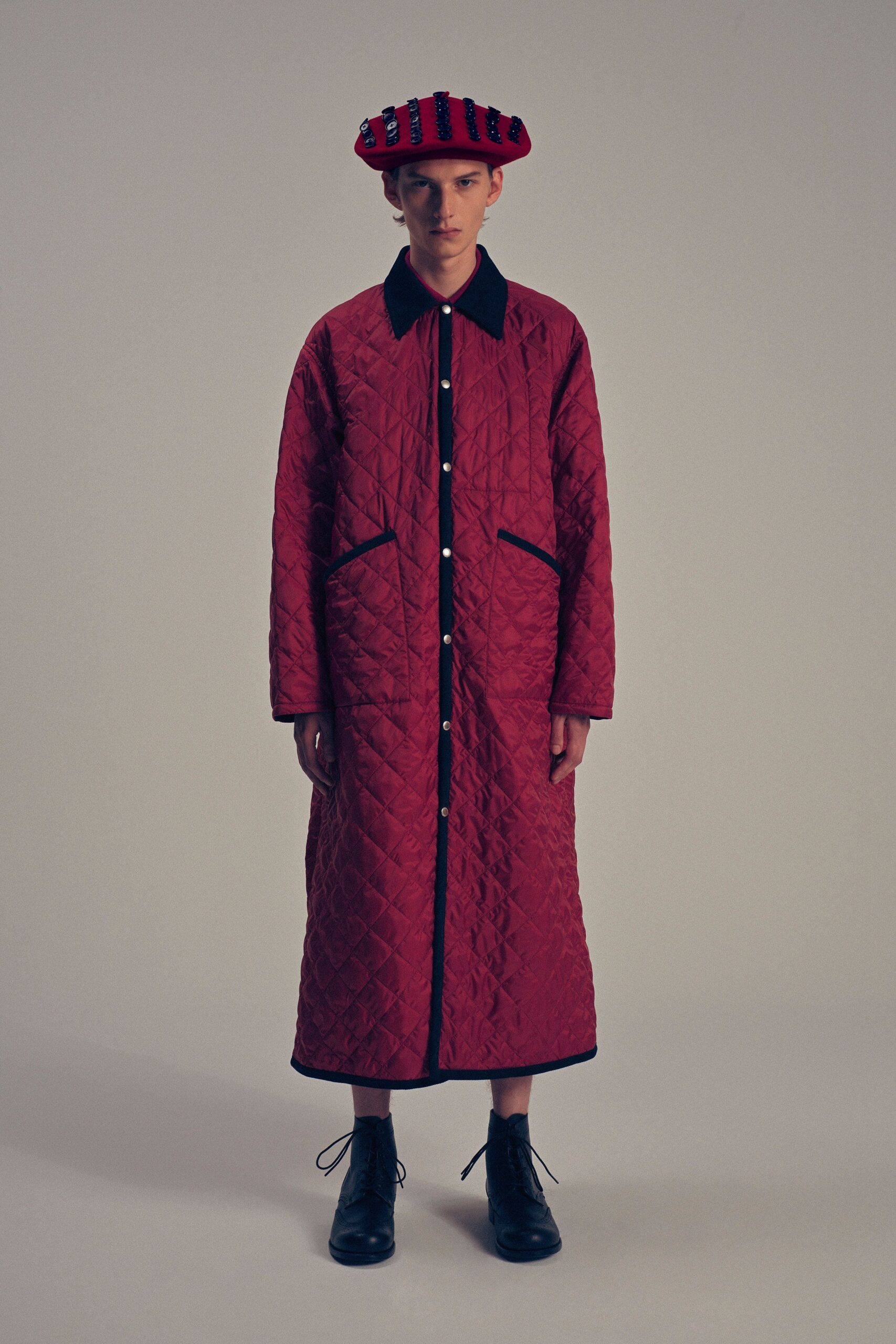 red cotton long-sleeve collared relaxed quilted buttoned coat