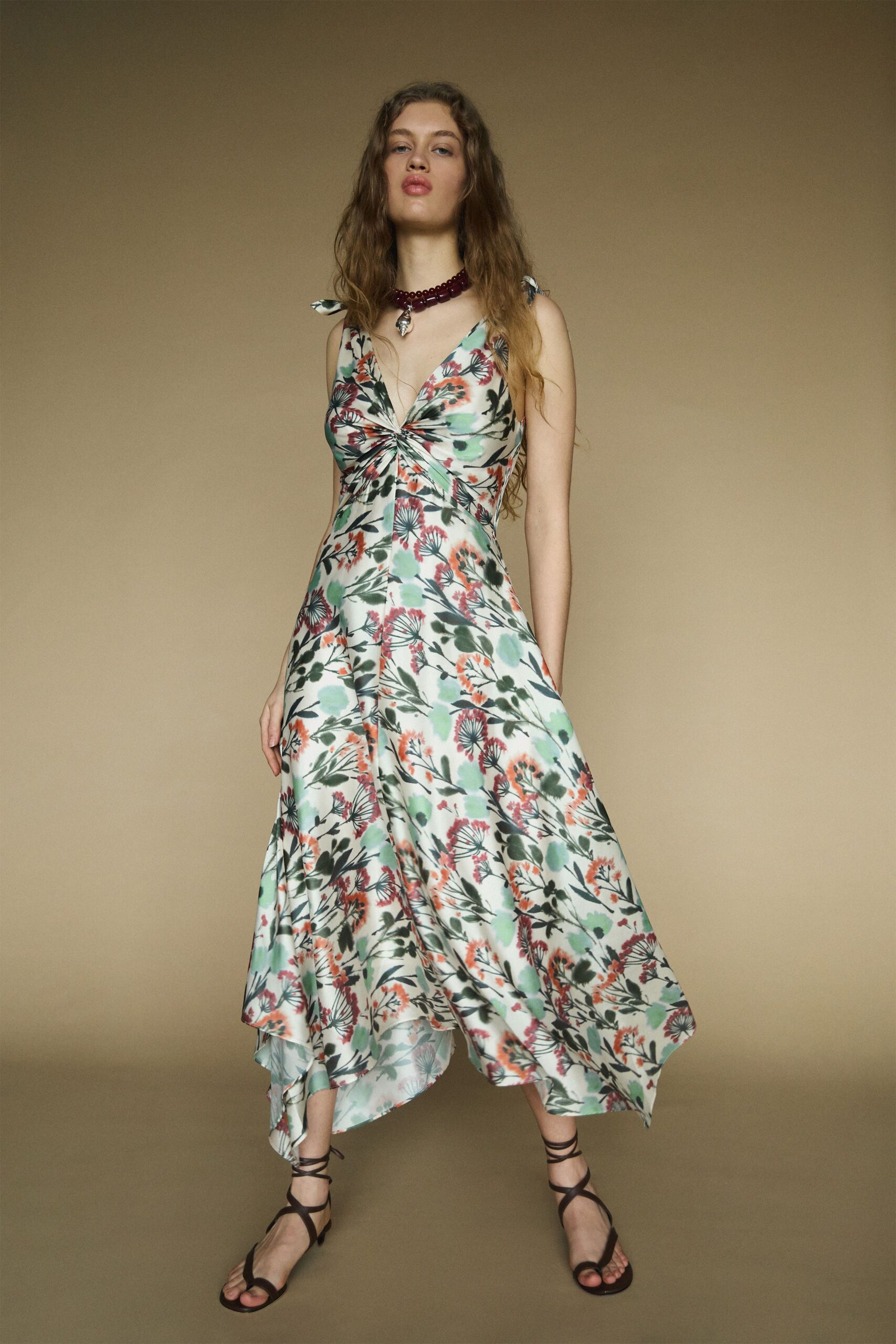 green silk sleeveless v-neck fitted floral draped dress
