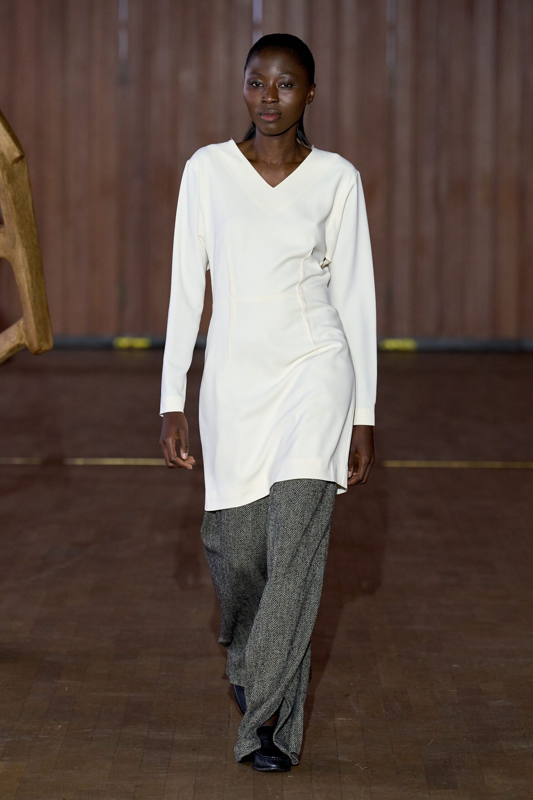 white fitted dress with gray pants