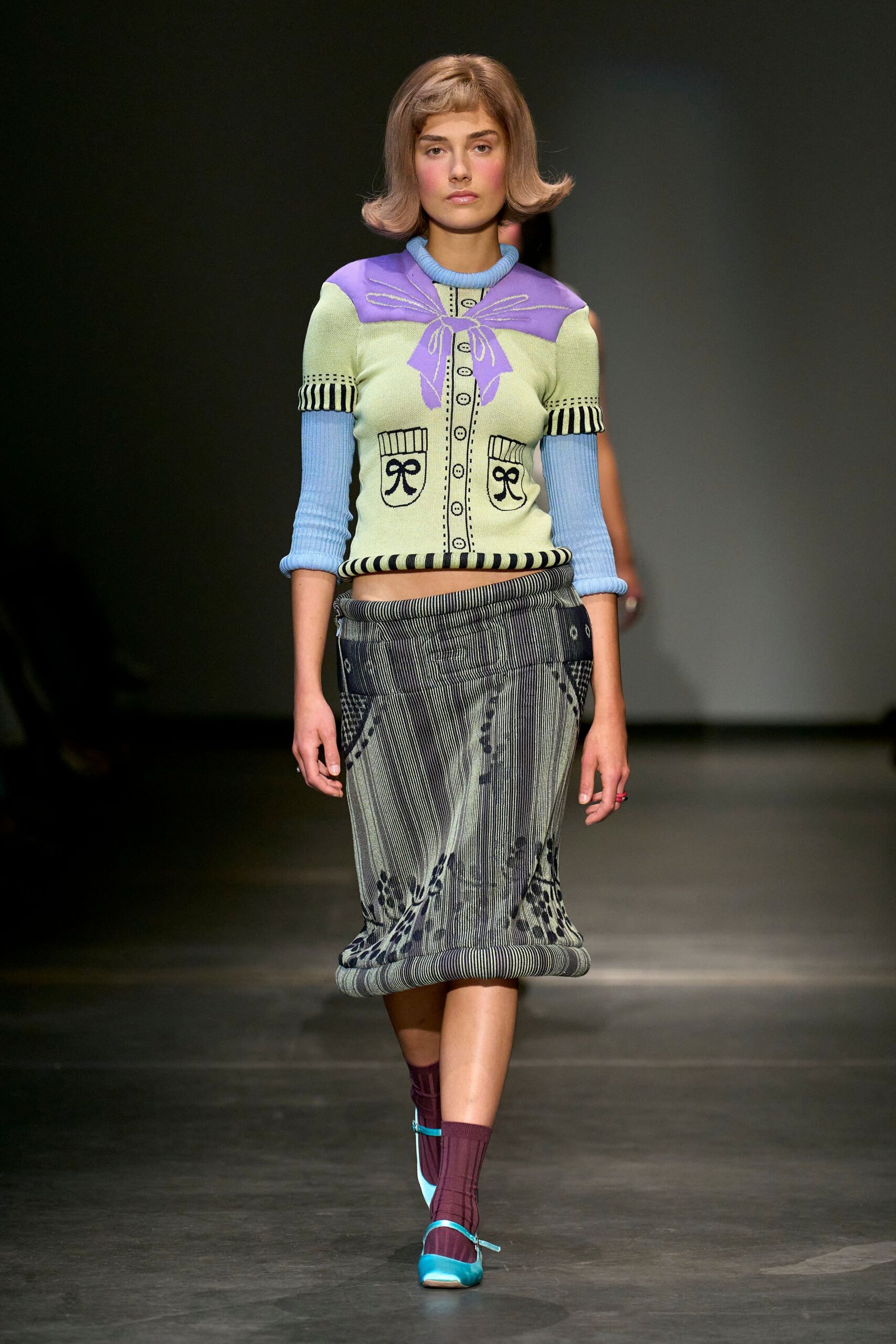 fitted green blue purple top with gray midi skirt