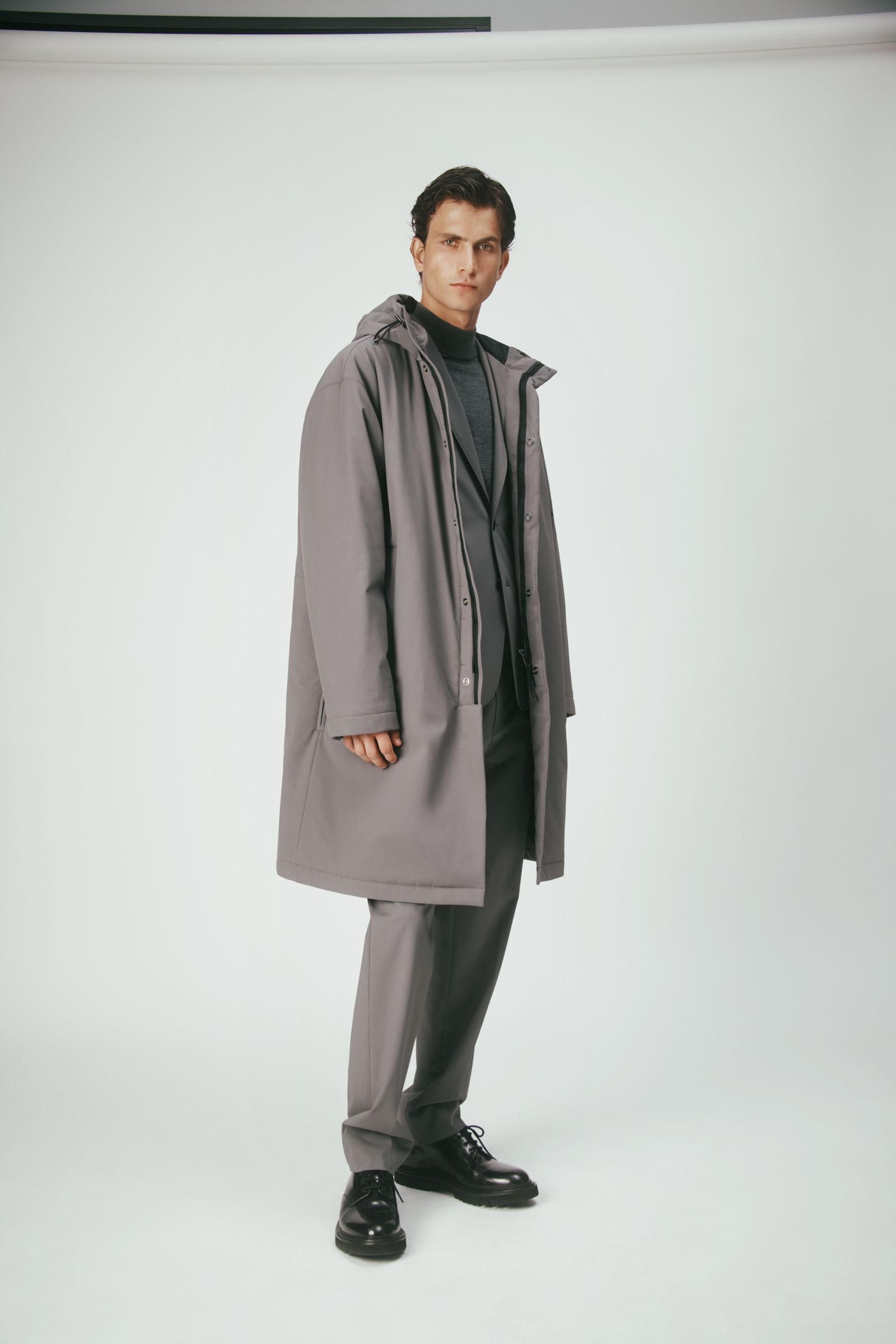 gray neoprene coat and suit