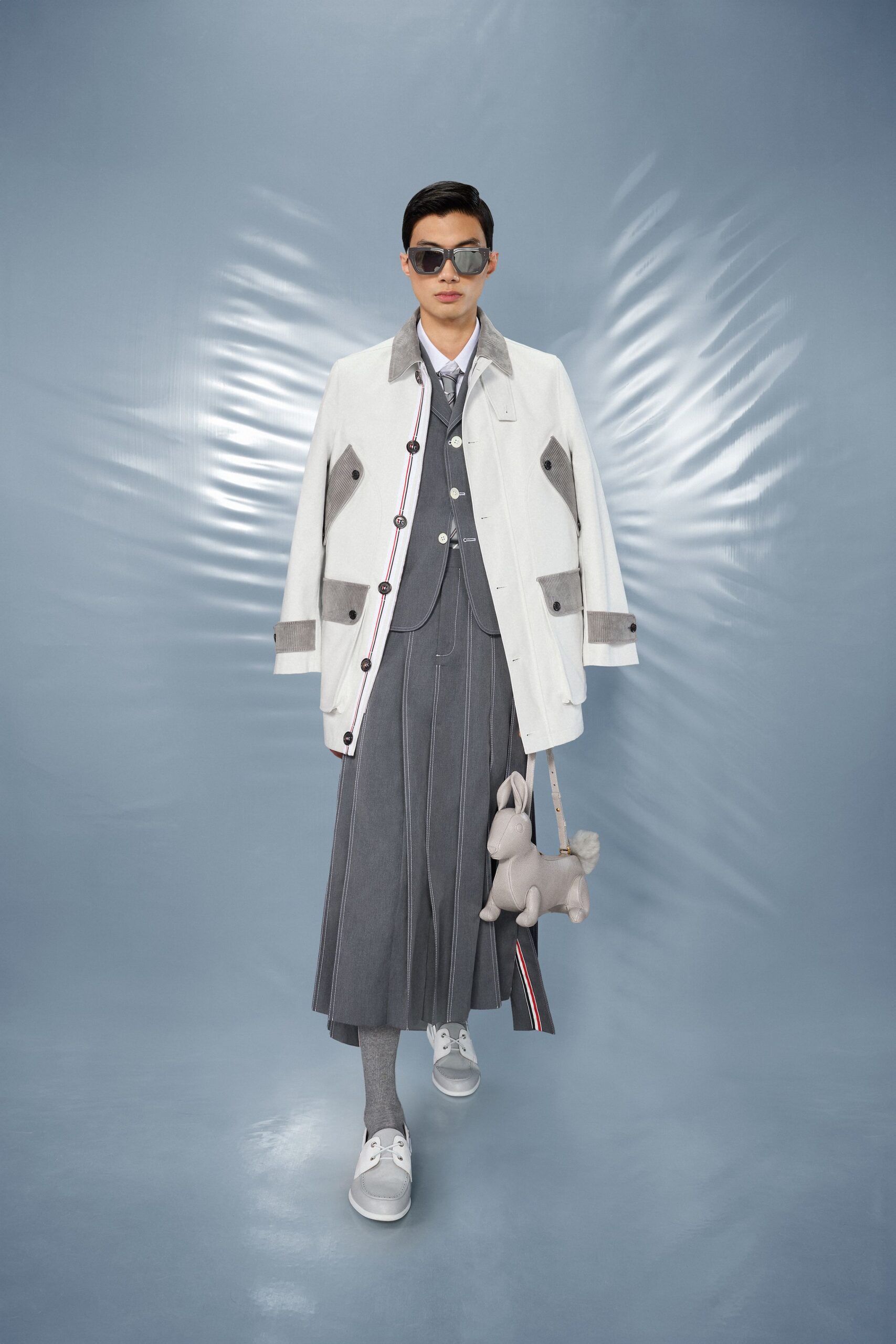white cotton long-sleeve collared structured buttoned coat