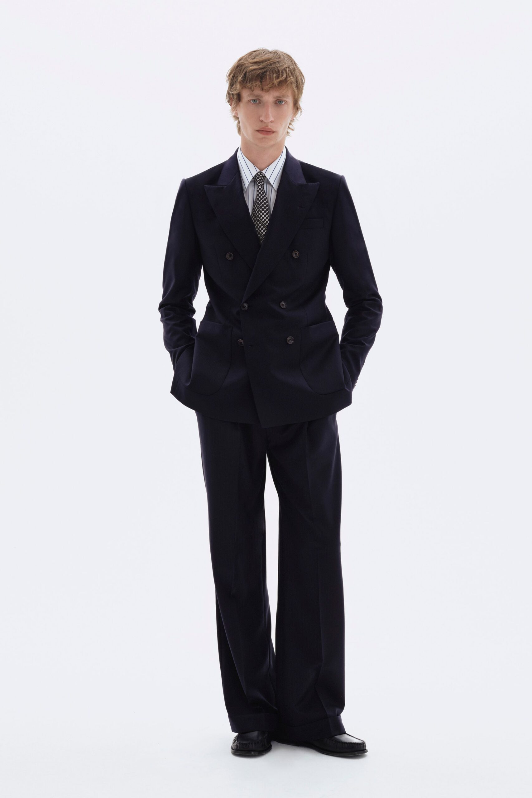 black tailored suit with striped shirt